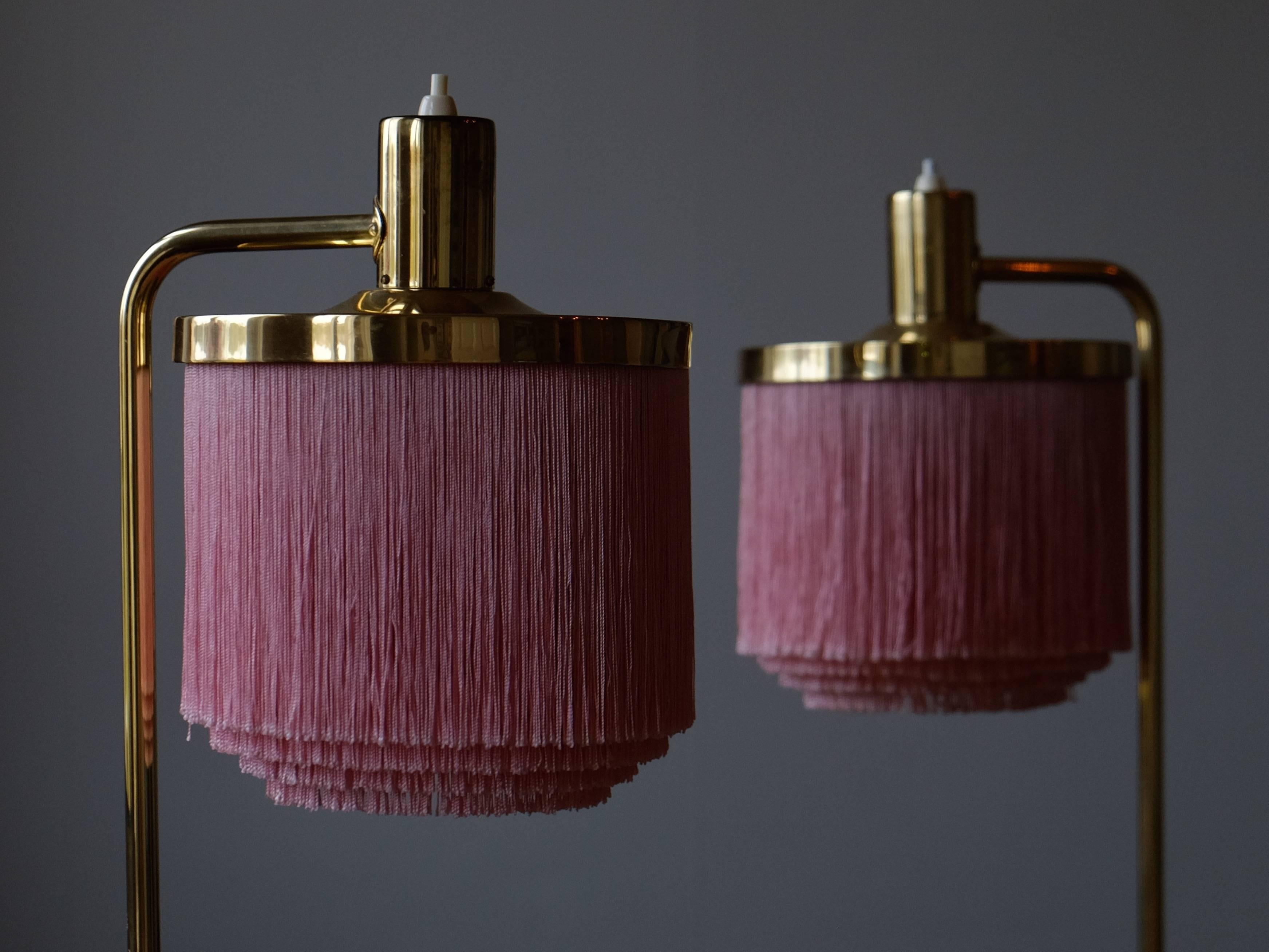 Rare pair of pink table lamps produced by Hans-Agne Jakobsson in Markaryd, Sweden.
New wiring.