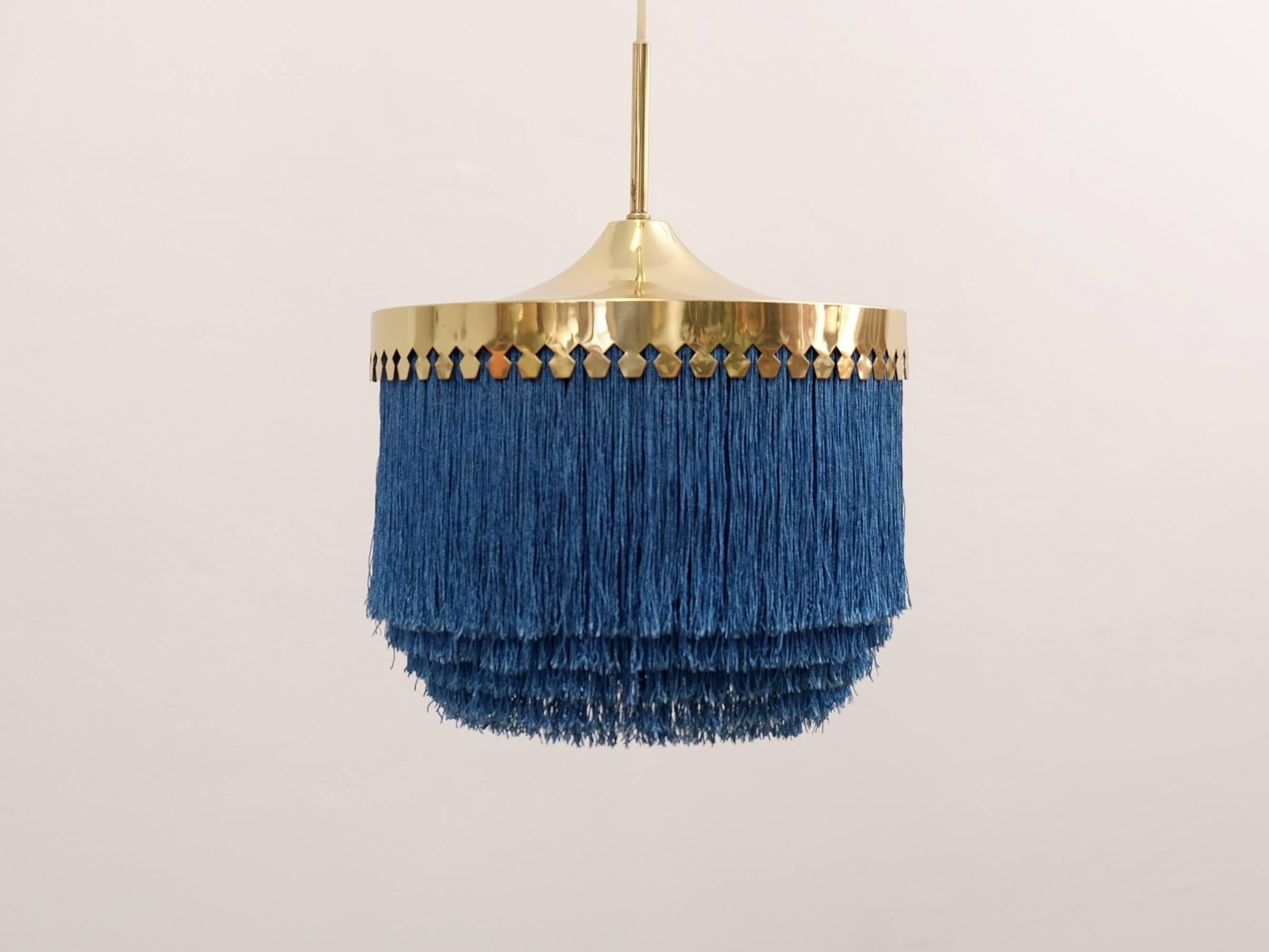 Blue fringes and brass.
Produced by Hans-Agne Jakobsson, Markaryd, Sweden, 1960s.
Height is adjustable.