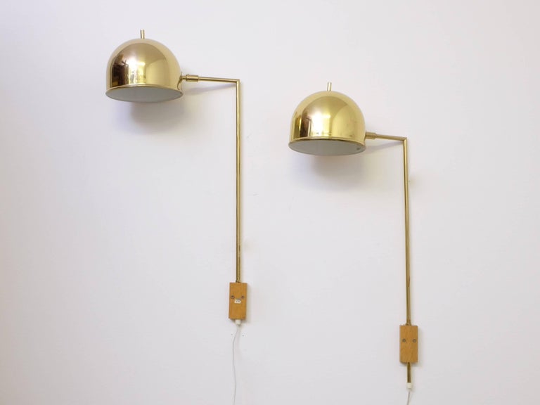 Set of two wall lamps/bedside lamps in brass, model V-75 manufactured by Bergboms, Sweden, 1960s.
Very good condition. 
Please note: 6 lamps available. 
