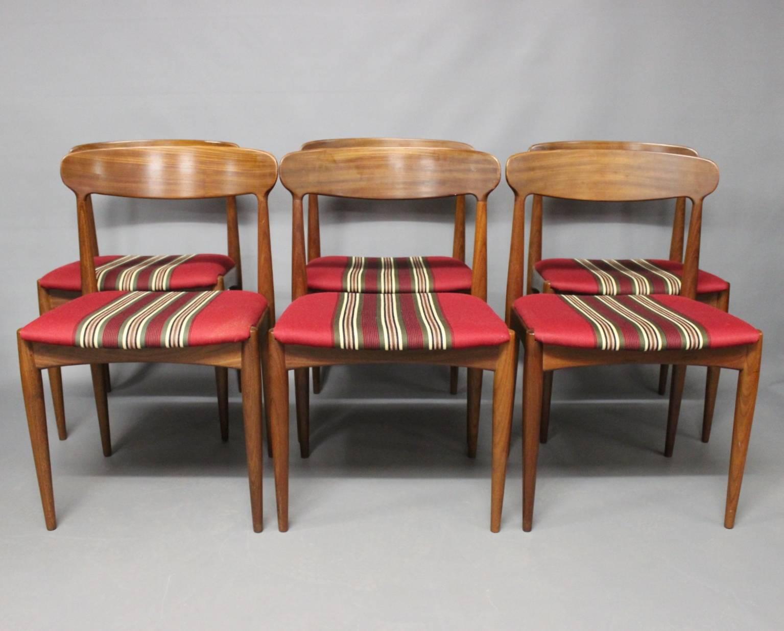 A set of six dining room chairs in rosewood designed by Johannes Andersen and manufactured Uldum furniture factory in the 1960s.