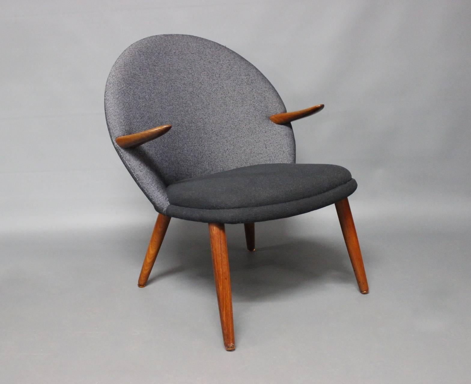 Easy chairs in teak and newly upholstered in grey hallingdal wool designed by Kurt Olsen for Glostrup furniture factory in the 1950s. The chairs can be sold separately.
