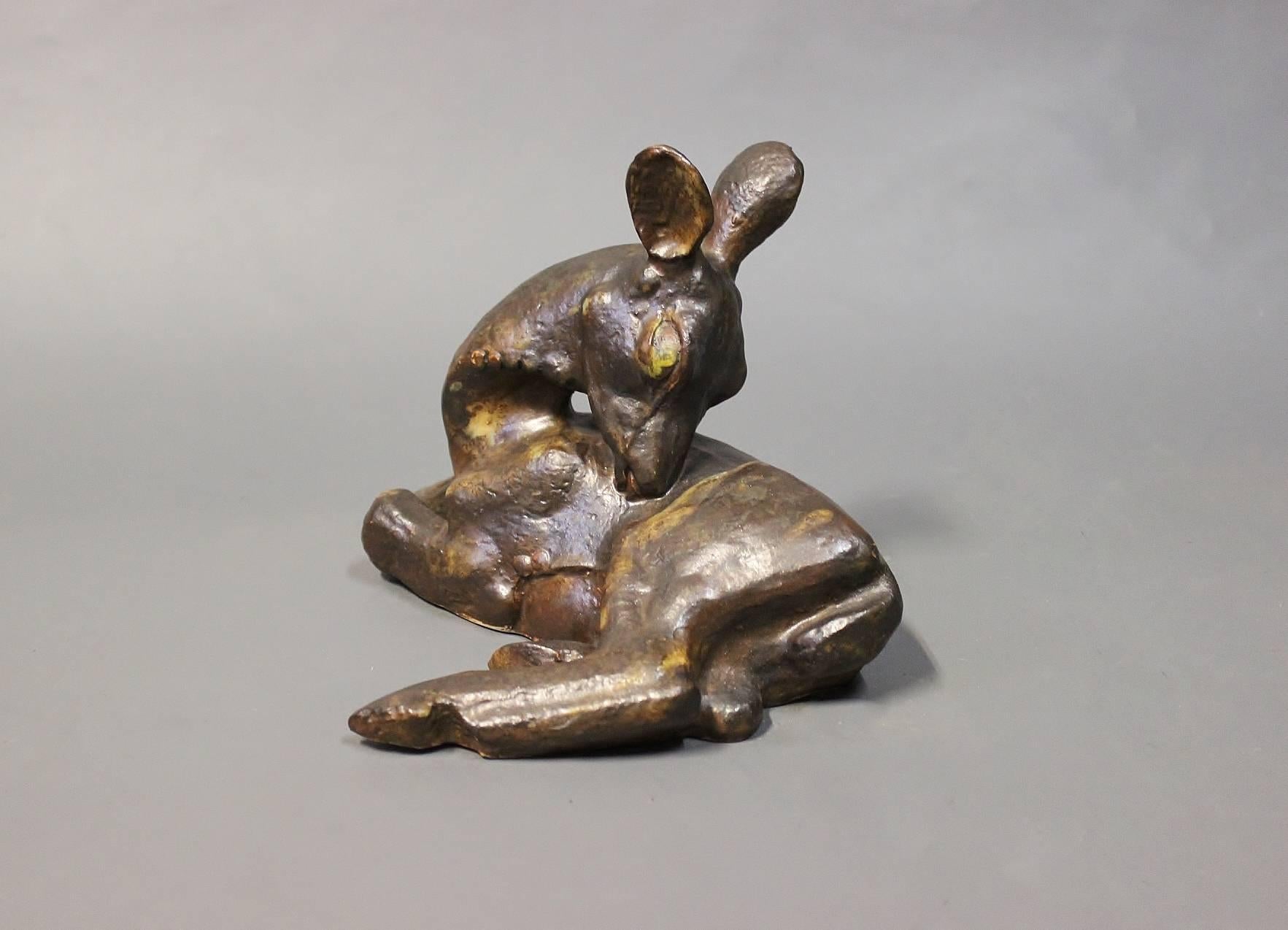 Dark brown ceramic figure, laying deer, no.: 161 by Arne Bang in 1929.