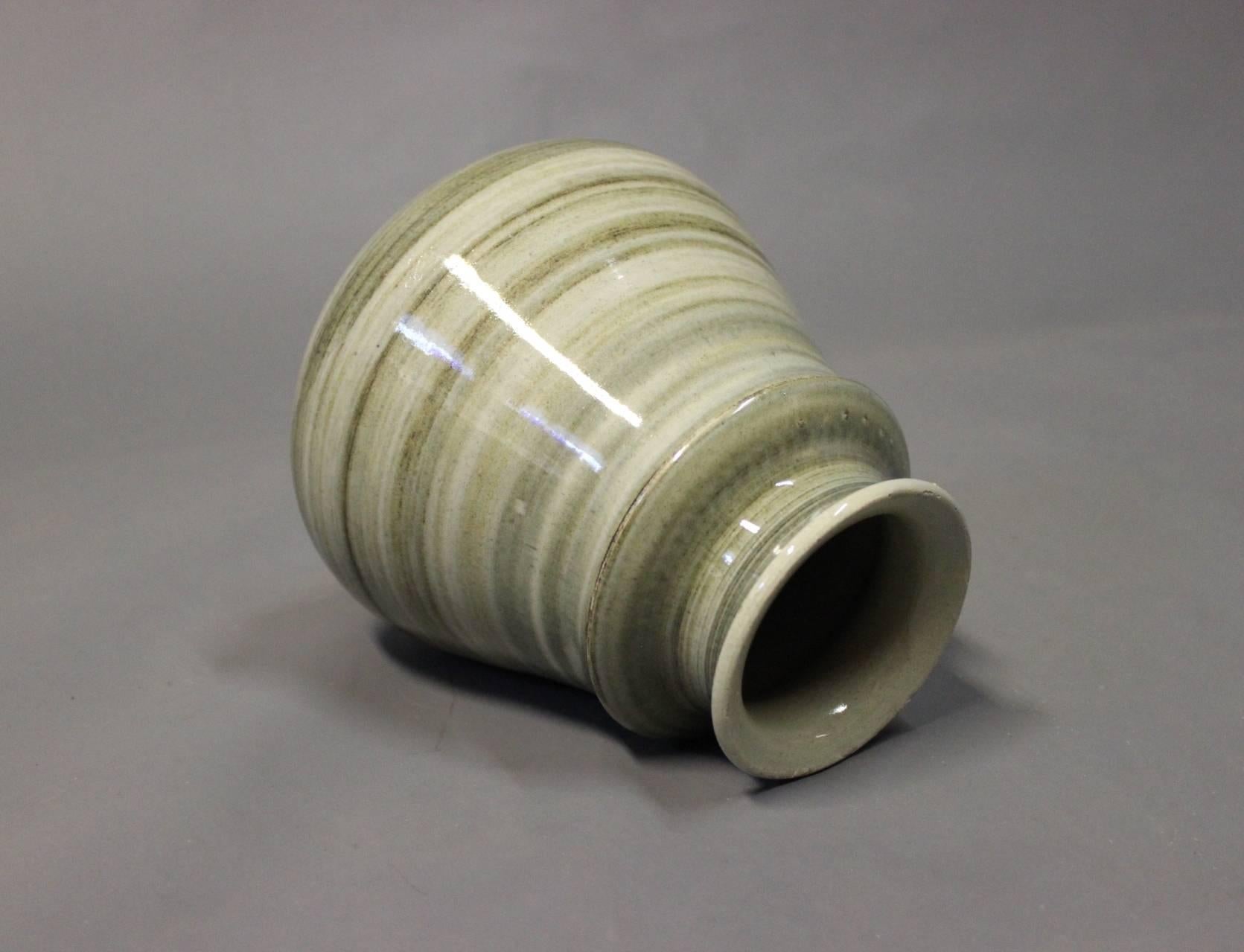 Ceramic vase with a green glaze by Höganäs from the 1960s. The vase is signed Claus Ivansson.