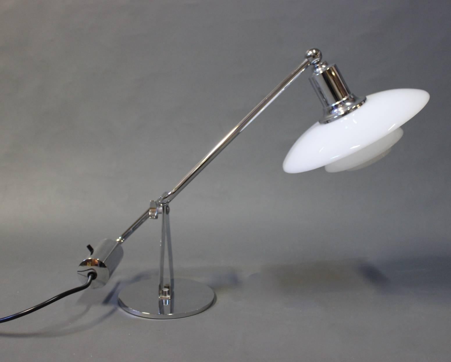 Piano lamp PH 2/1 designed by Poul Henningsen in 1943 and manufactured by Louis Poulsen in the 1980s. The shades are of white opaline glass and the frame of chrome-plated metal.