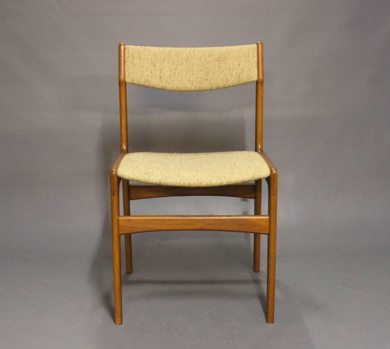 A set of six dining room chairs in teak and light wool designed by Erik Buch and from the 1960s. The chairs are in great vintage condition and will only be sold as a set.