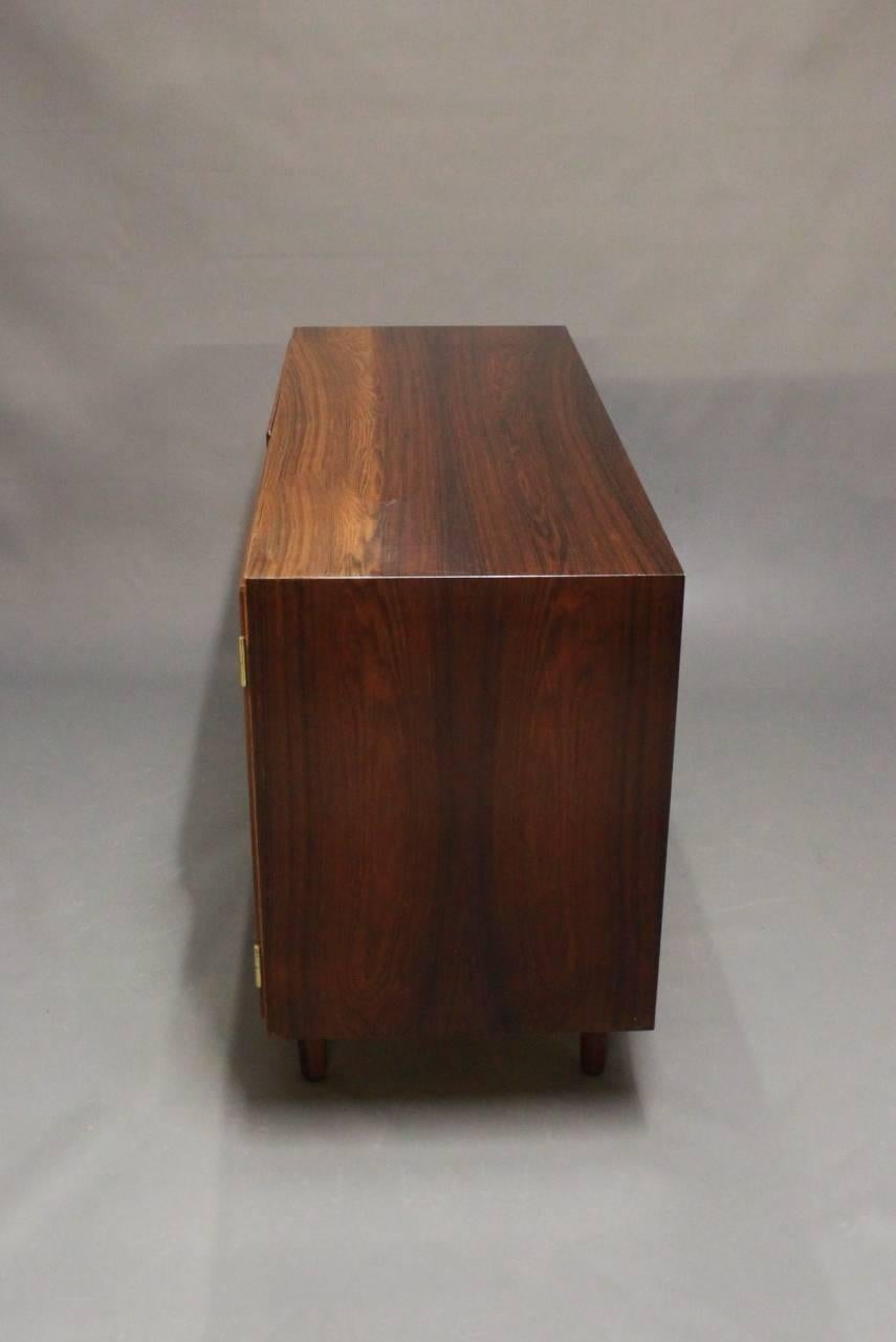 Sideboard in rosewood designed by Poul Hundevad and manufactured at Hundevad Furniture Factory in the 1960s.