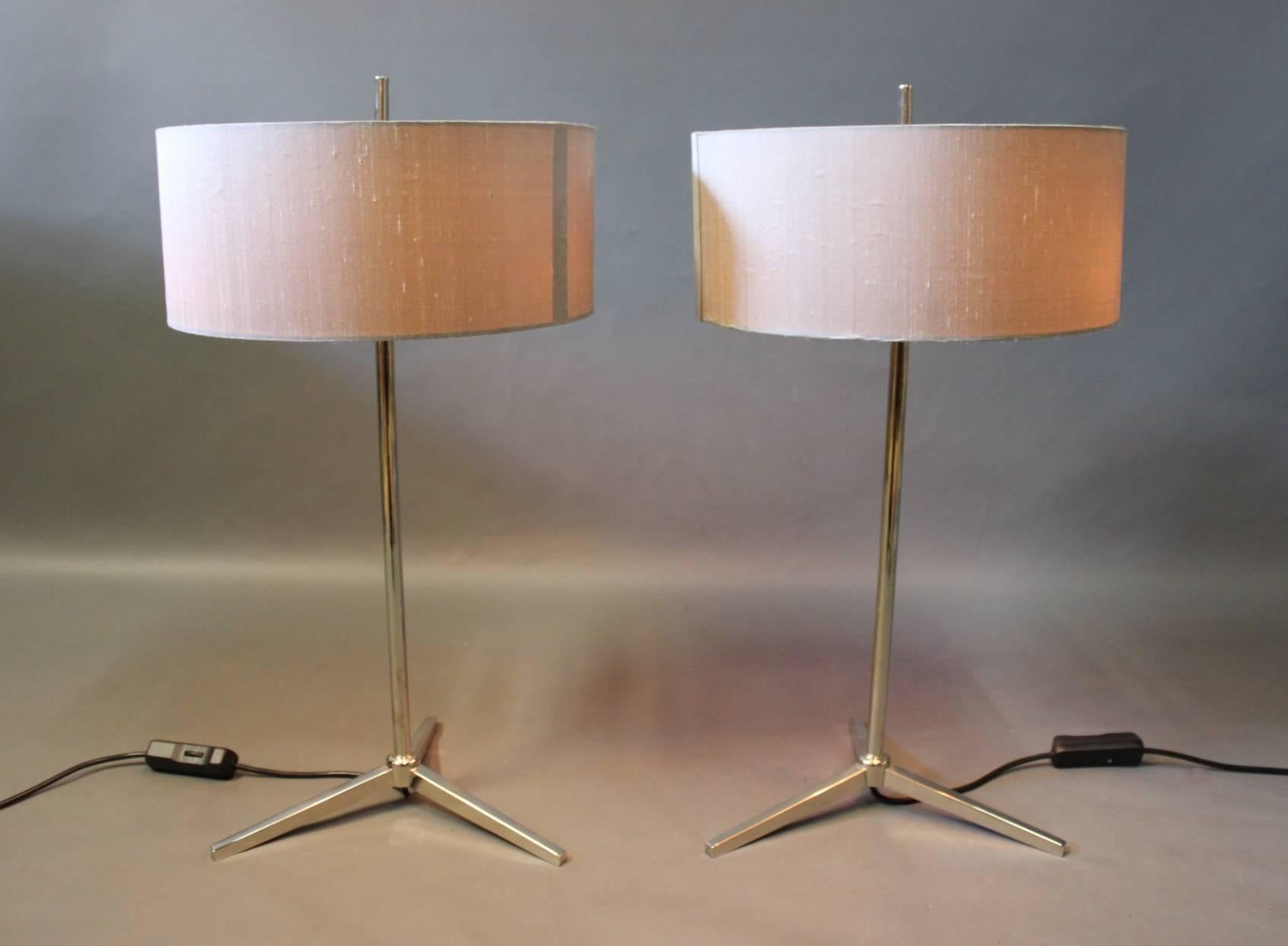 A set of two table lamps of chrome-plated metal and grey lamp shades of Italian design from the 1980s. The lamps has three light bulbs and a dimmer function.