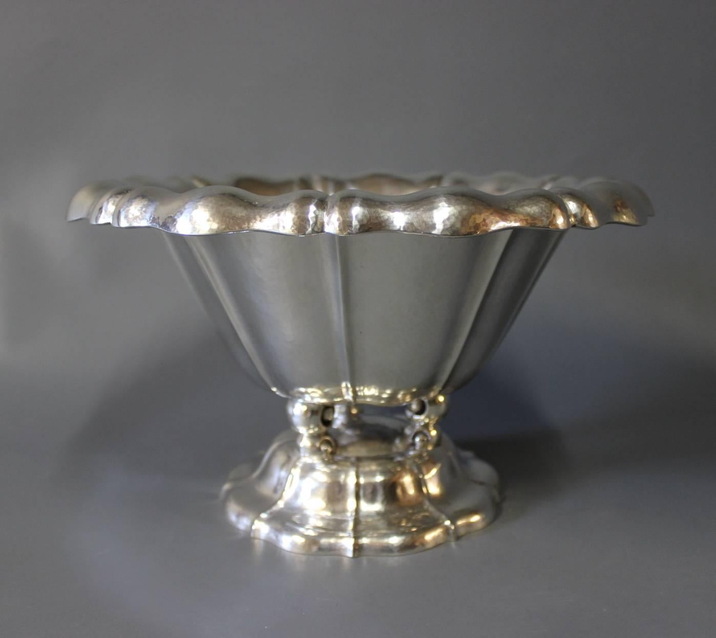 Large bowl on foot/centerpiece in 835 silver stamped E. Timmermann and numbered 359367.
  