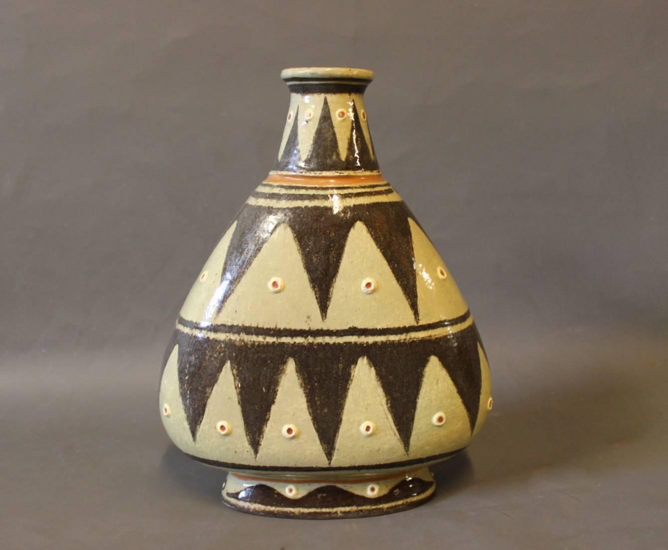 Ceramic vase in edged pattern in brown and light colours. The vase is of Danish design and from the 1960s.