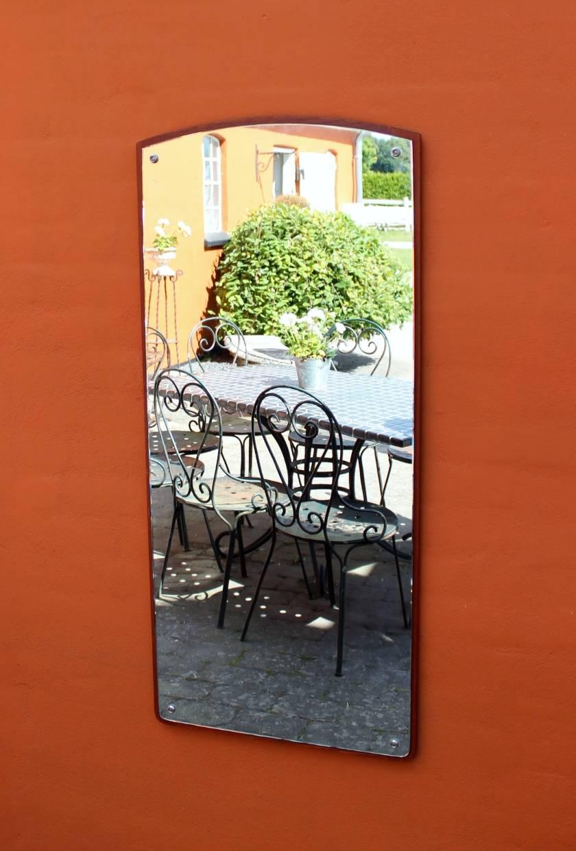 Mirror in teak of Danish design from the 1960s. The mirror is in great vintage condition.