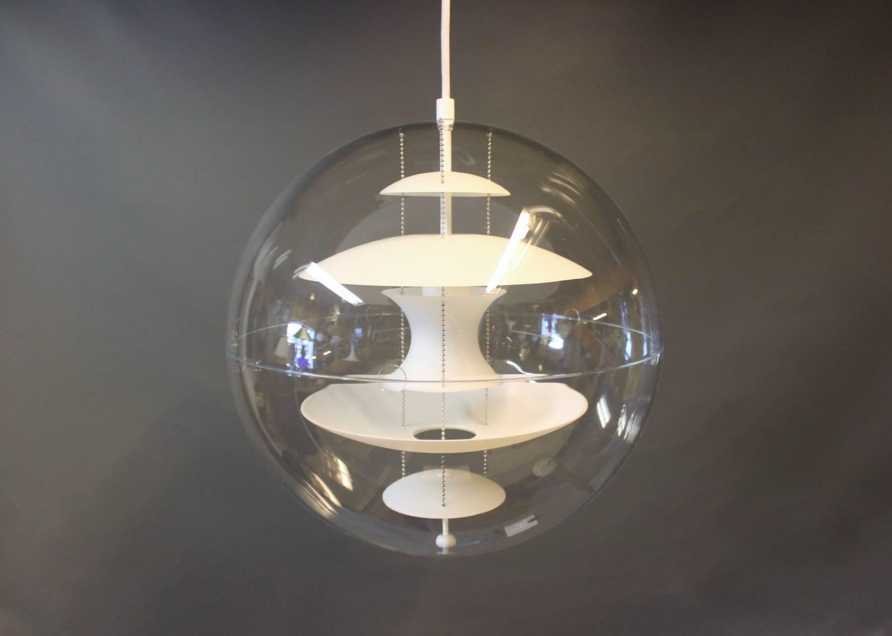 Globe, Ø40 designed by Verner Panton in 1969 and manufactured by VerPan in the 1980s. The lamp is a transparent acrylic globe with five hanging reflectors in white opaline glass.