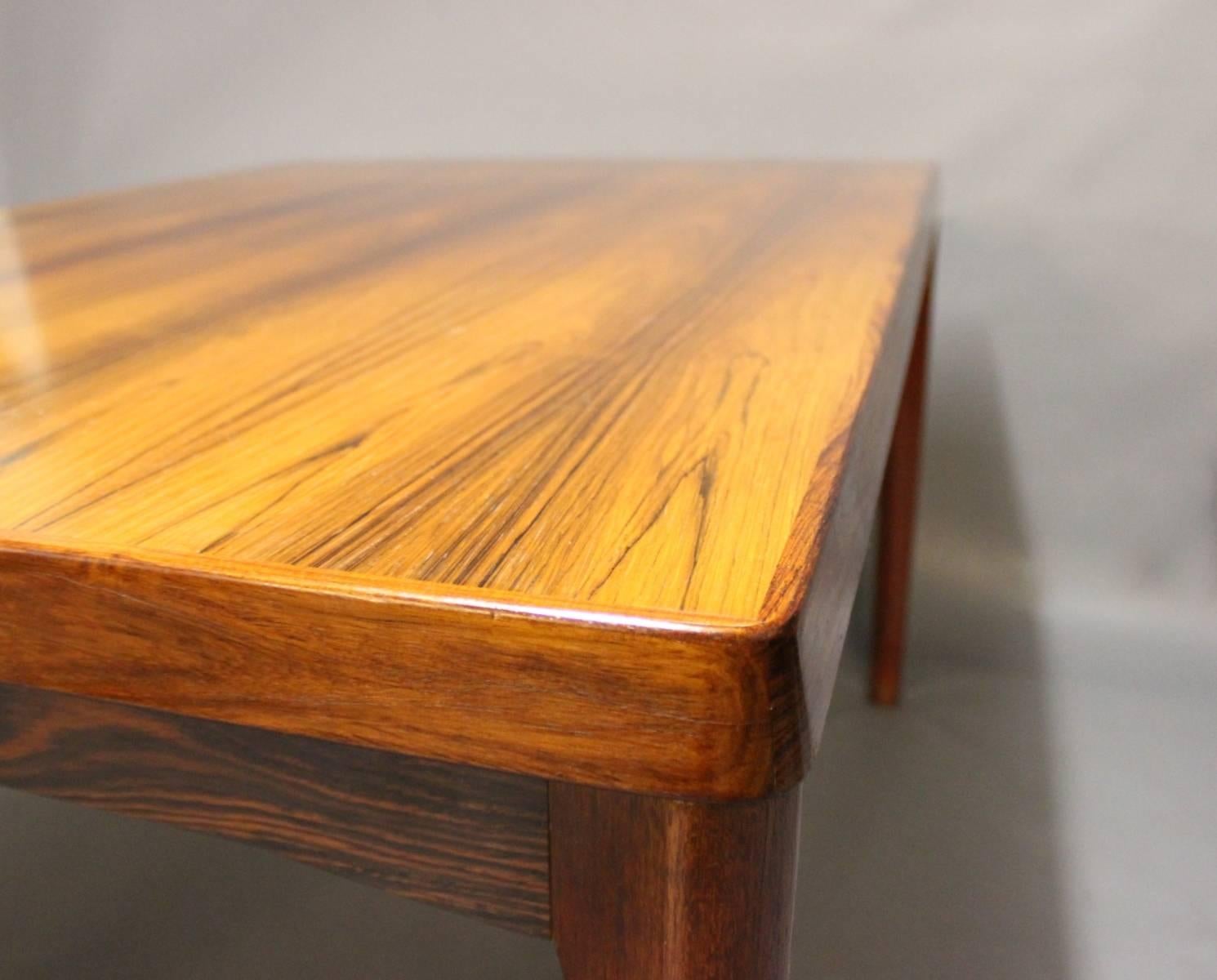 Dining Table in Sunfaded Rosewood with Extensions by Henning Kjærnulf, 1960s In Good Condition In Lejre, DK