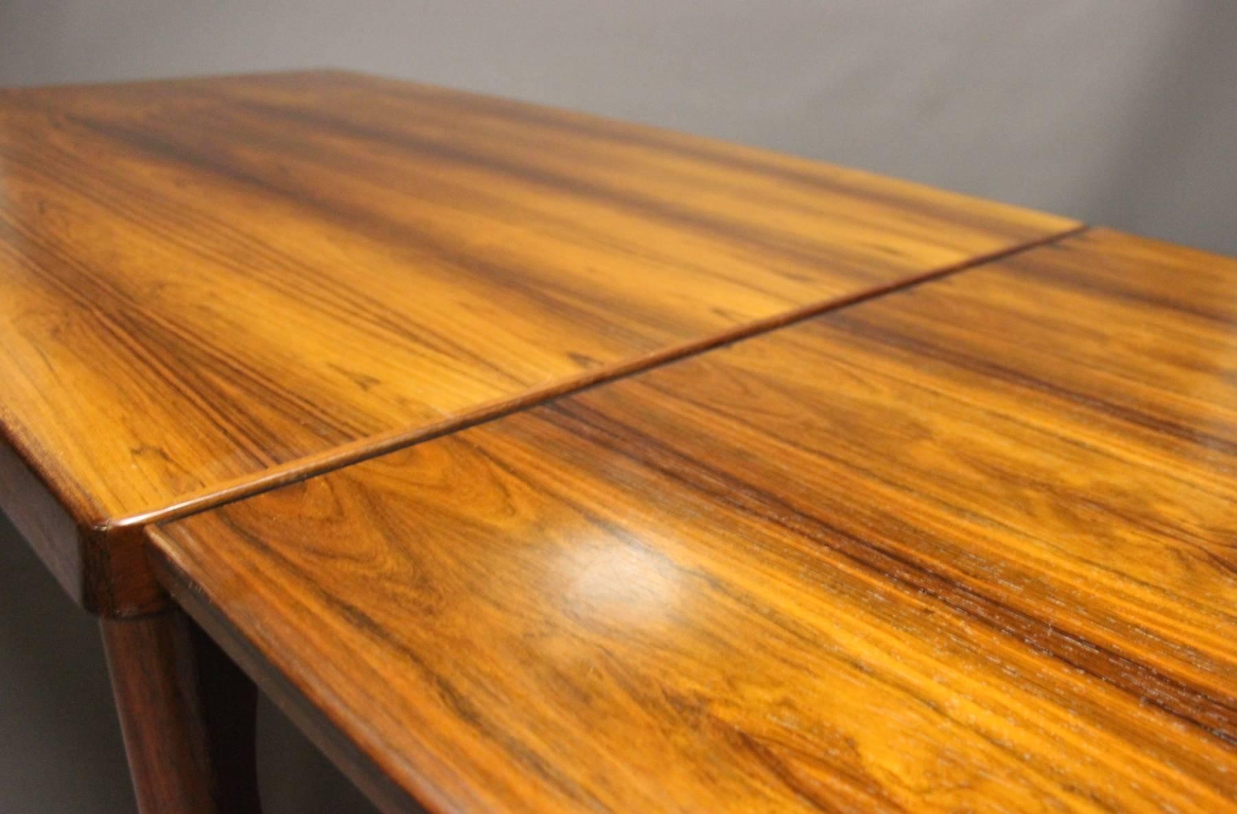 Mid-20th Century Dining Table in Sunfaded Rosewood with Extensions by Henning Kjærnulf, 1960s