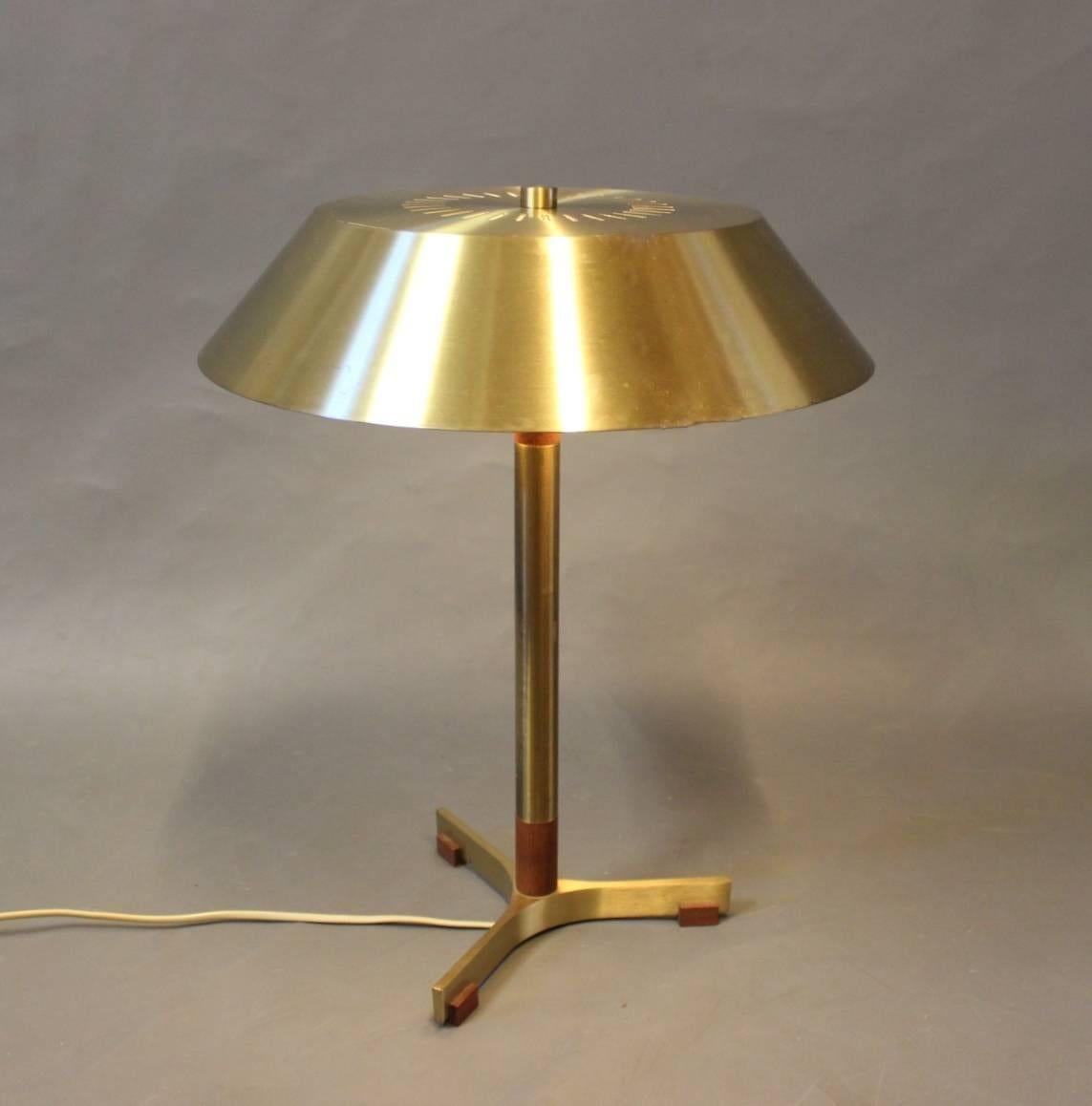 Tablelamp, model President, in brass and teak designed by Fog and Mørup in the 1960s.