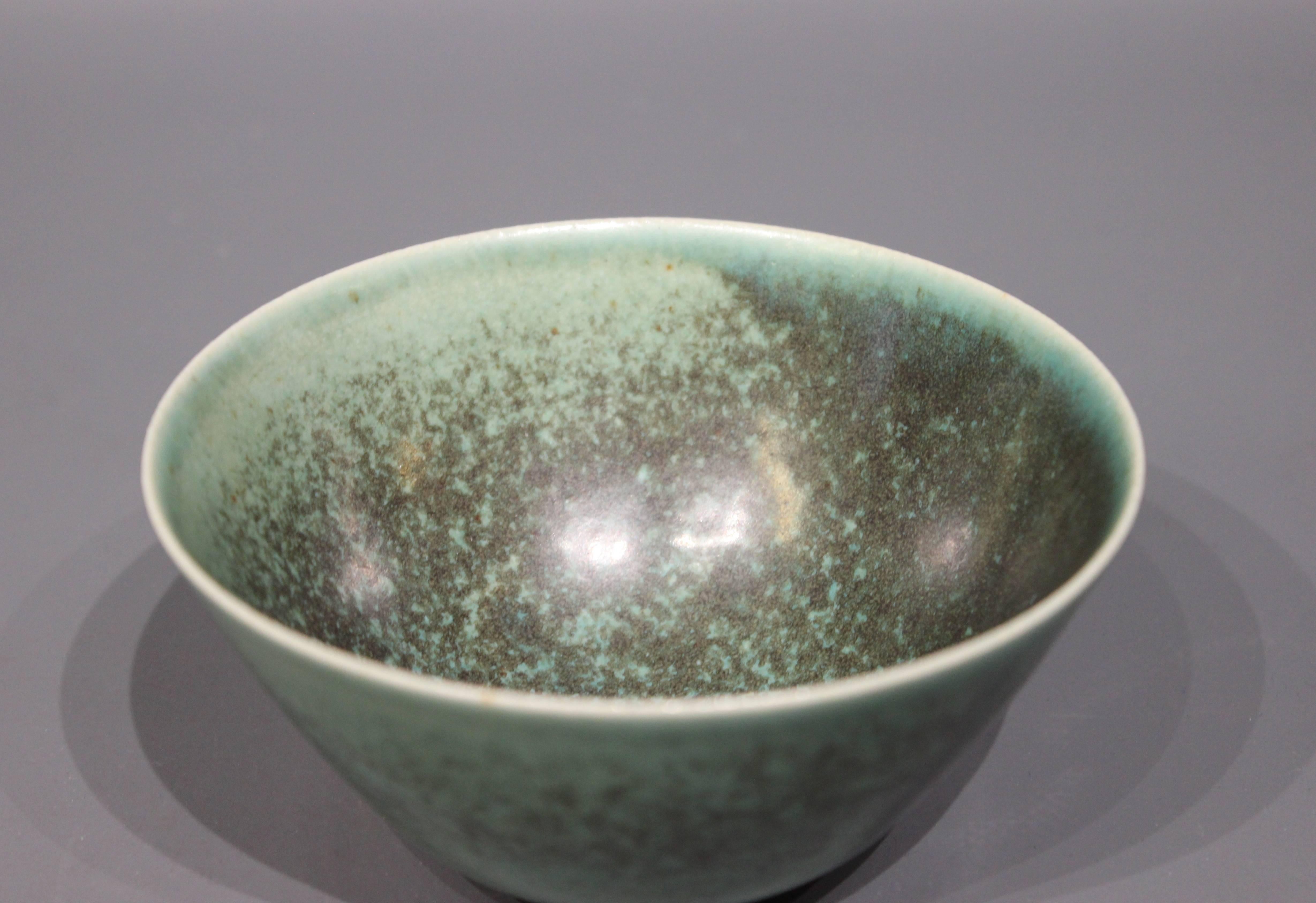 Ceramic bowl with a light green/turquoise glaze, no.: 3 by Saxbo. The bowl is in great vintage condition.