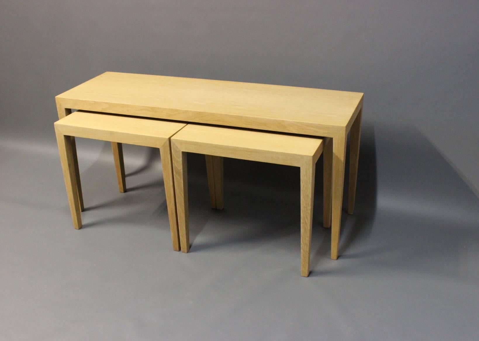 Nest of tables in oak, no. 165 designed by Severin Hansen and manufactured by Haslev furniture factory. The tables were manufactured in Denmark and are stamped with the mark 