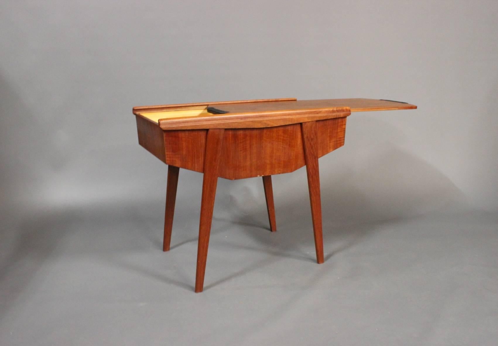 Scandinavian Modern Sewing Table in Teak with Sliding Topplate by a Danish Manufacturer, circa 1960s