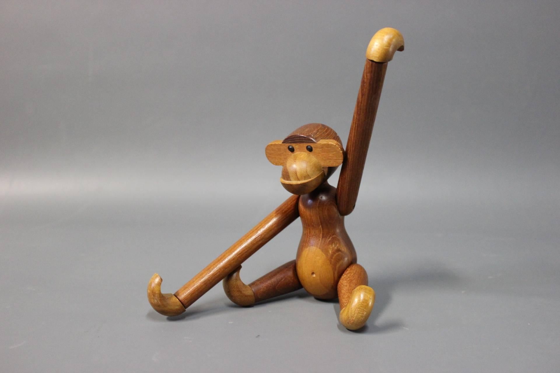 Small Wooden monkey by Kay Bojesen in teak and Limba. This collectable was first designed in 1951 and this particular monkey is from 1953. The item is of Danish design. 