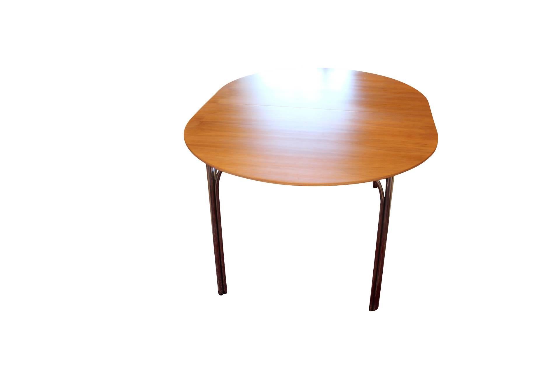 Tobago dining table, model 8311, designed by Nanna Ditzel in 1993 and manufactured by Fredericia Furniture. The table comes with two extension leaves. 

If you would like more pictures, please don't hesitate to ask!