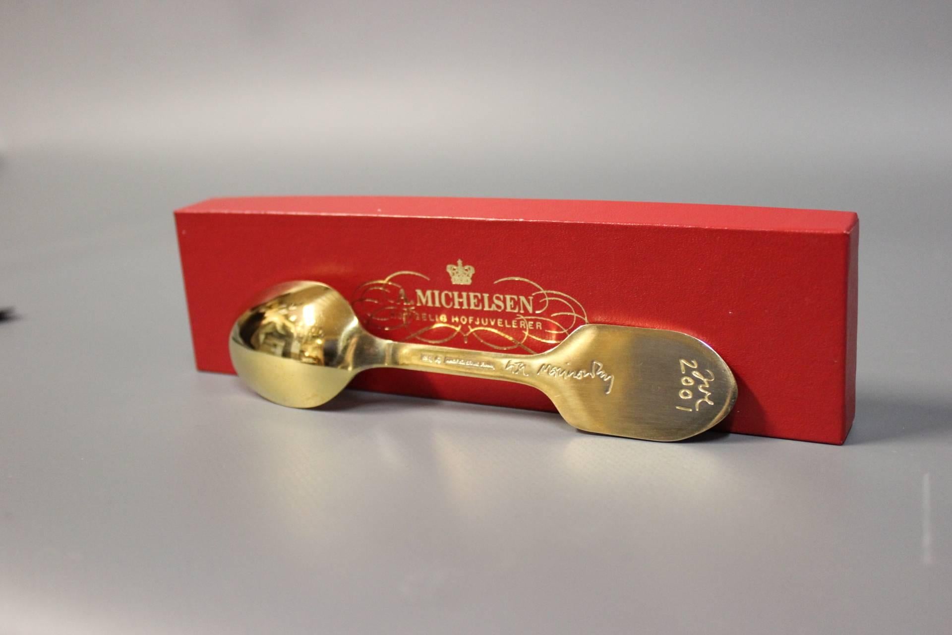 Christmas spoon by A. Michelsen from 2001, gilded sterling silver 925 s. The spoon is with the motif "The Heart" and designed by Lise Malinovsky.