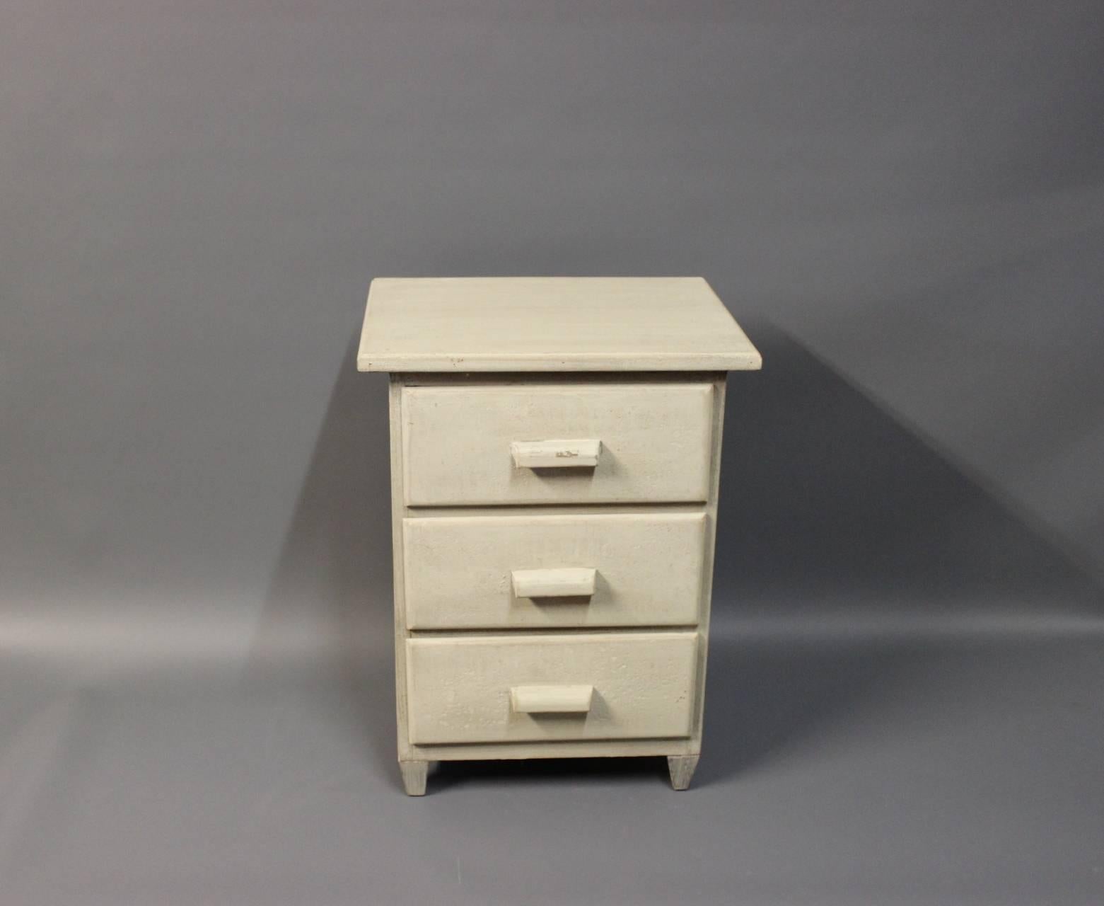 Grey painted miniature children's chest of drawers. The chest is in good condition and from around the 1880s.
