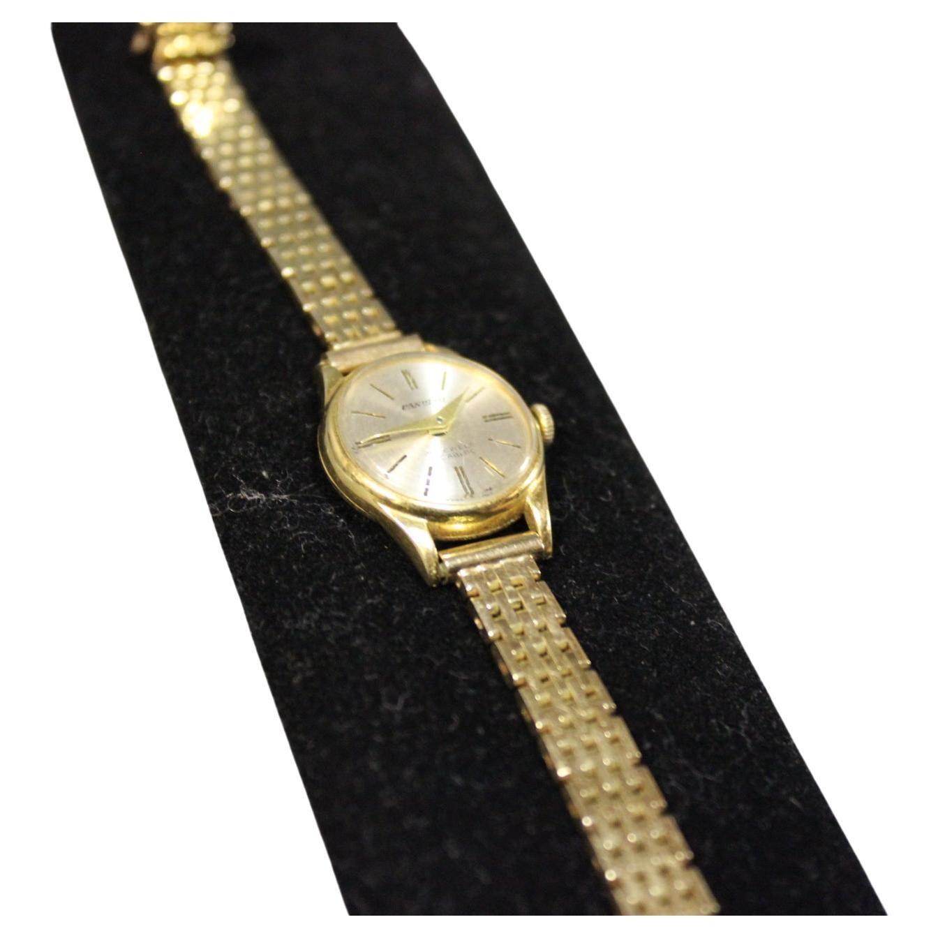 candino gold watch