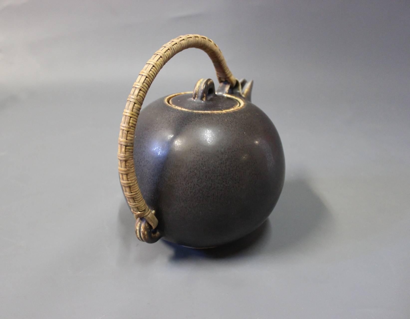 Danish Saxbo Dark Brown Glazed Stoneware Teapot with Bast Handle No. 64, 1940s