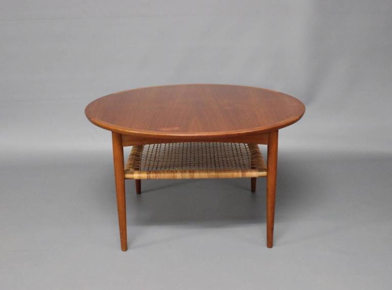 Scandinavian Modern Coffee Table in Teak with Cord Shelf by Møbelintarsia, 1960s For Sale