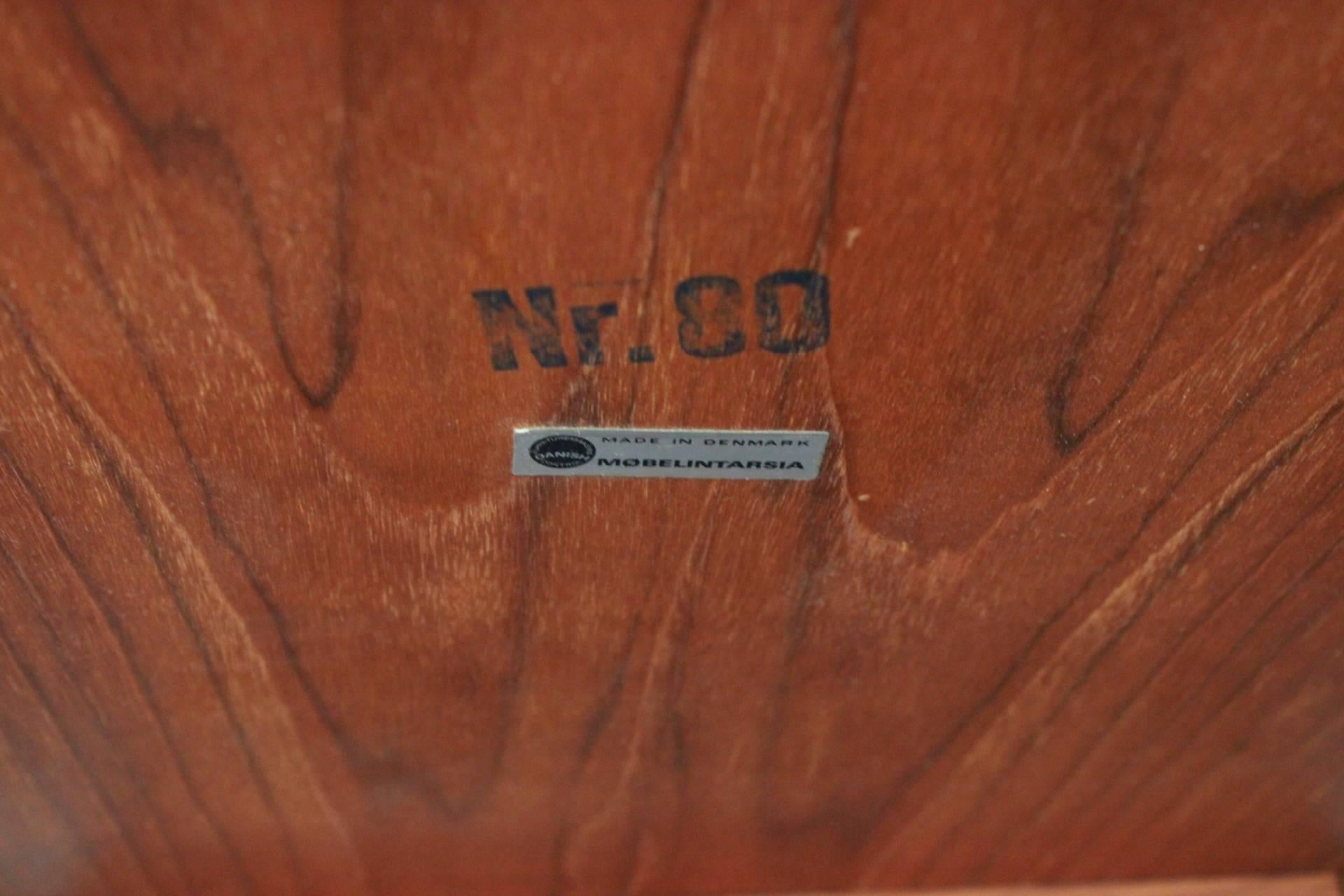 Coffee table in teak with cord shelf stamped 