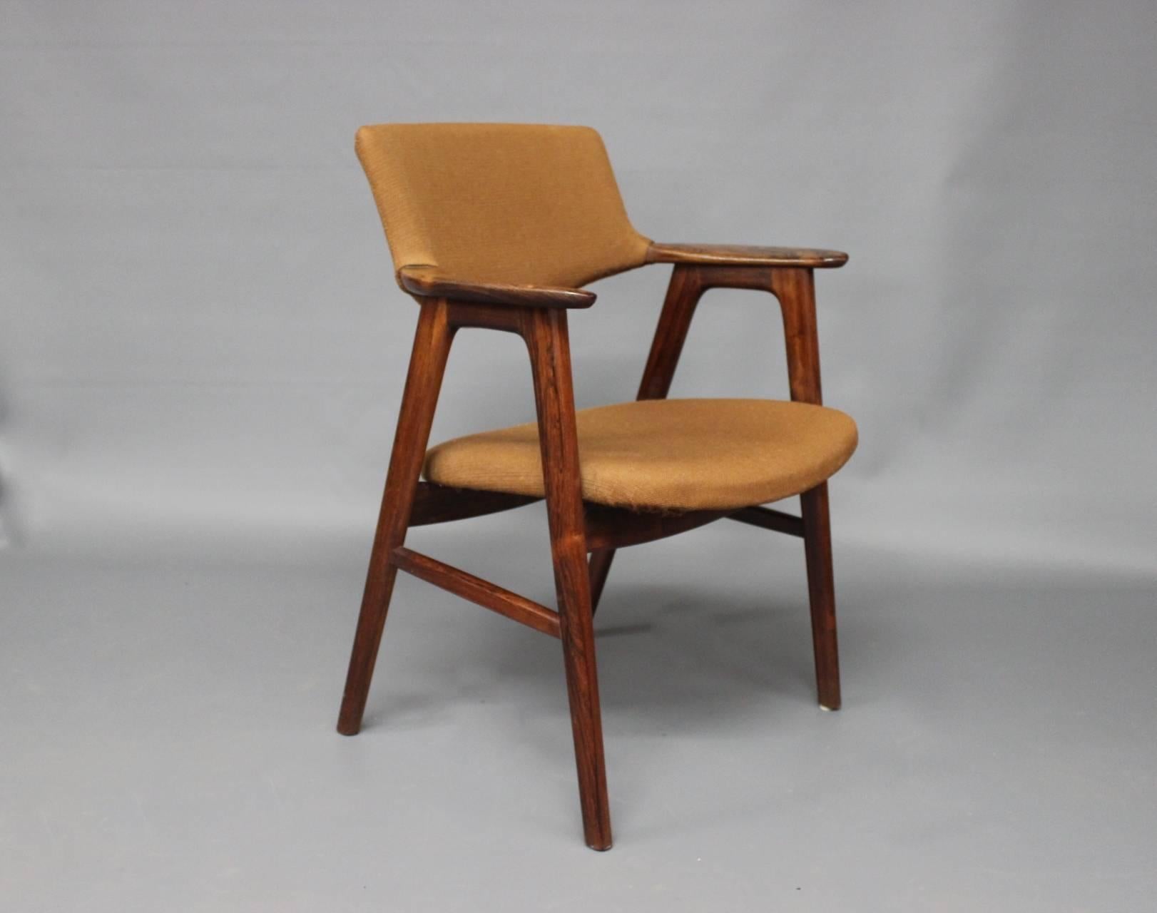 Armchair designed by Erik Kirkegaard and manufactured by Hoeng Furniture Factory in the 1960s. The chairs is of rosewood and upholstered in brown fabric.