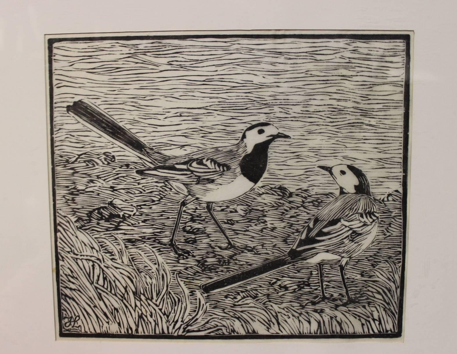 Woodcut on Japanese paper of a pair of Wagtails signed with monogram, J.L., in the print by the Danish artist Johannes Larsen, 1867-1961.