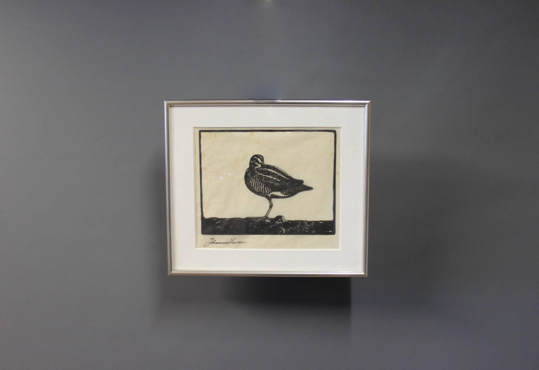 Woodcut on Japanese paper of a snipe signed in the print by the Danish artist Johannes Larsen, 1867-1961.