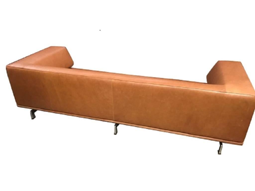 Erik Jørgensen Delphi sofa, model EJ450, designed by Hannes Wettstein in 2007. The sofa is upholstered with cognac colored elegance leather and with legs of aluminium.