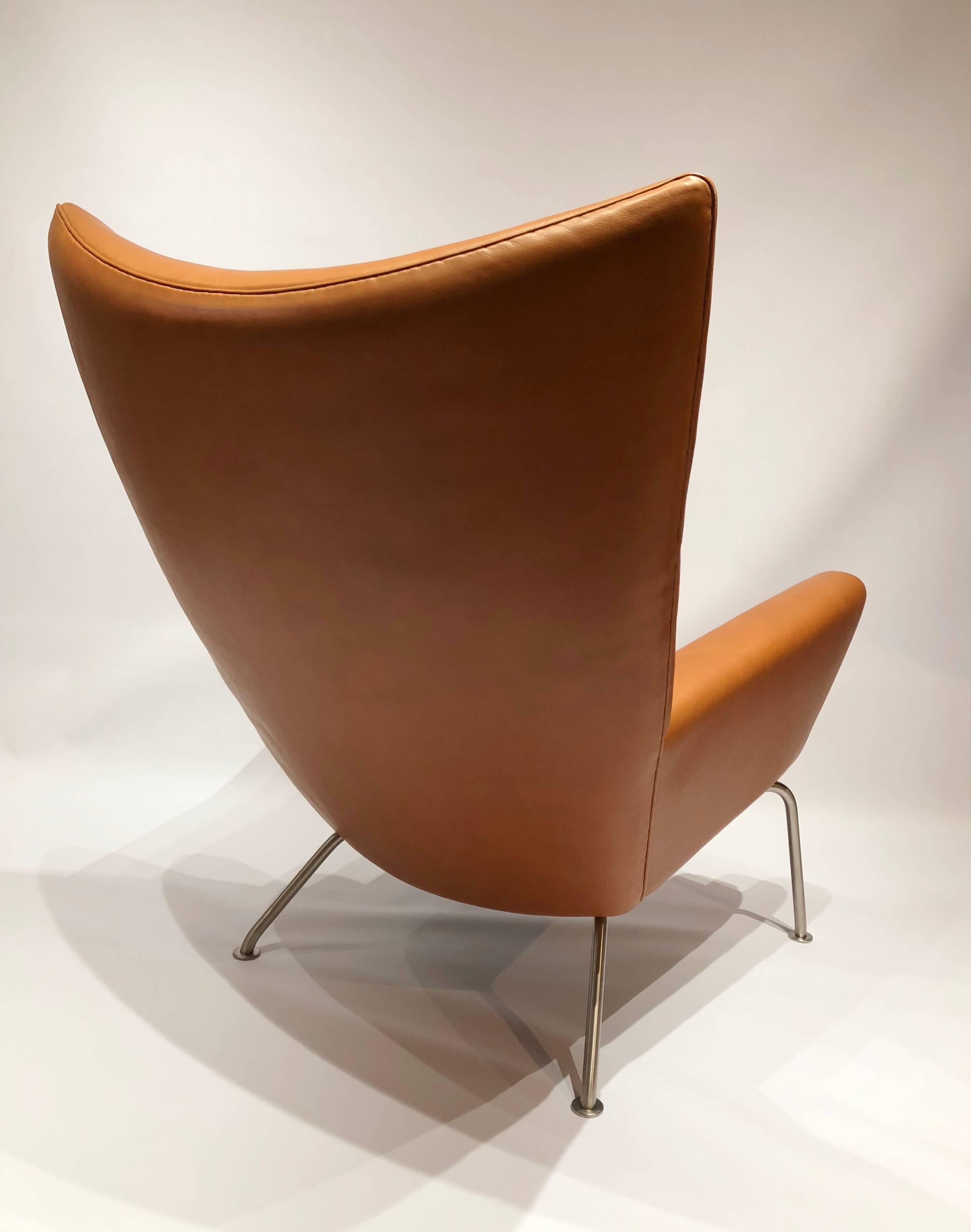 Wingchair, model CH445, in walnut elegance leather designed by Hans J. Wegner in 1960 and manufactured by Carl Hansen and Son.