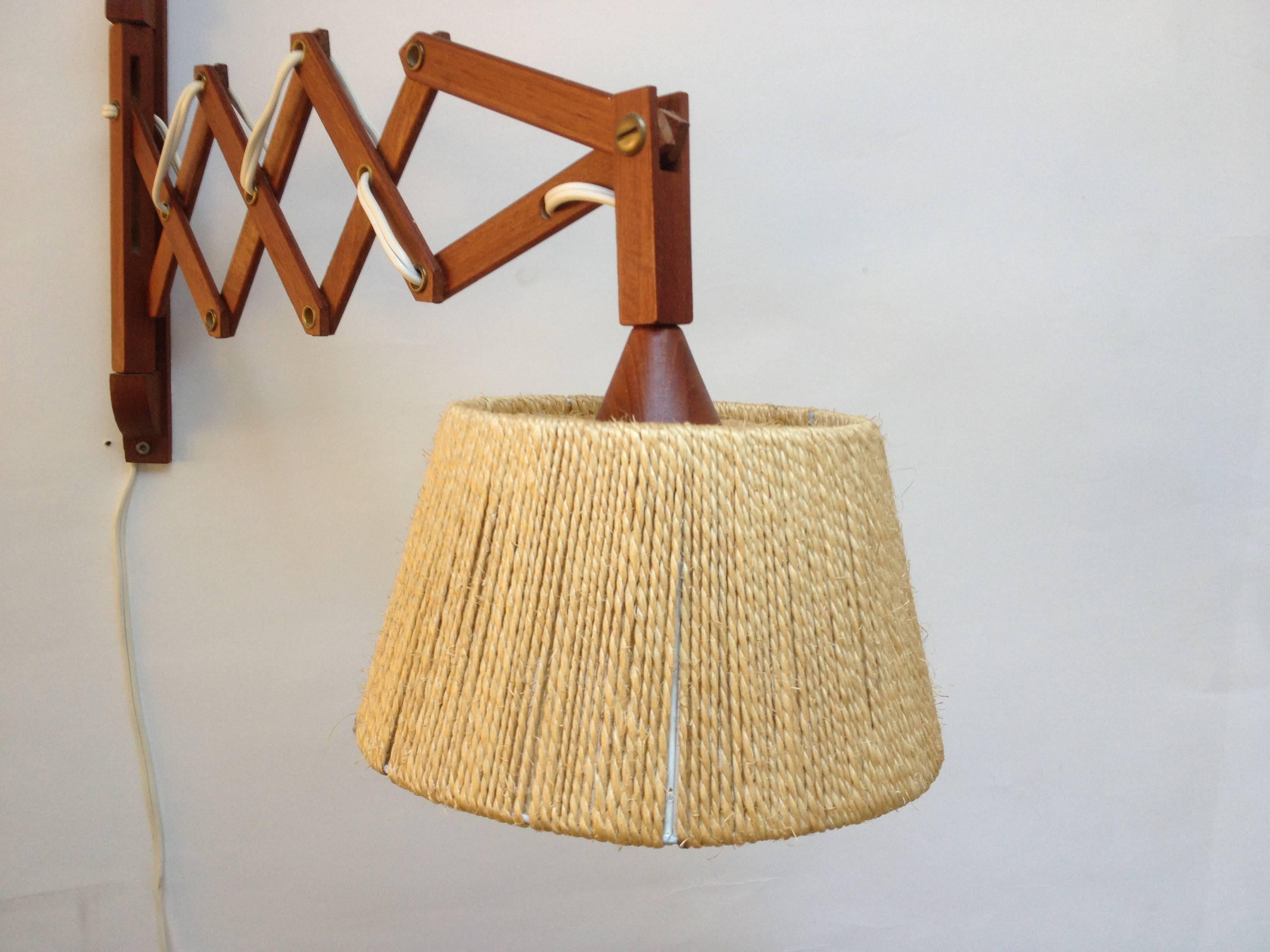 Fabulous Mid-Century teak wall light with a lovely Jute shade perfect for a beside lamp and or over your favorite reading chair this beauty pivots 180 degrees the lamp extends from 17.5