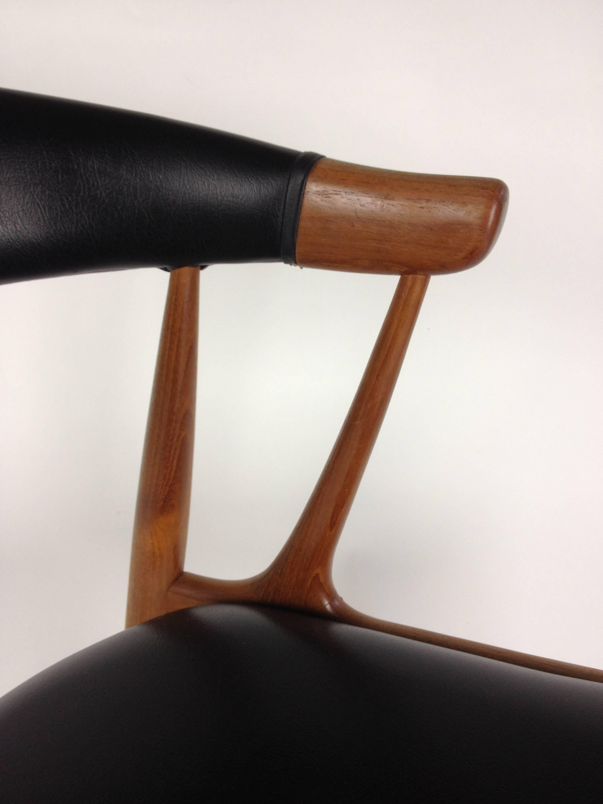 Naugahyde Striking Mid-Century Modern Teak Chair Designed by Johannes Andersen - Denmark For Sale