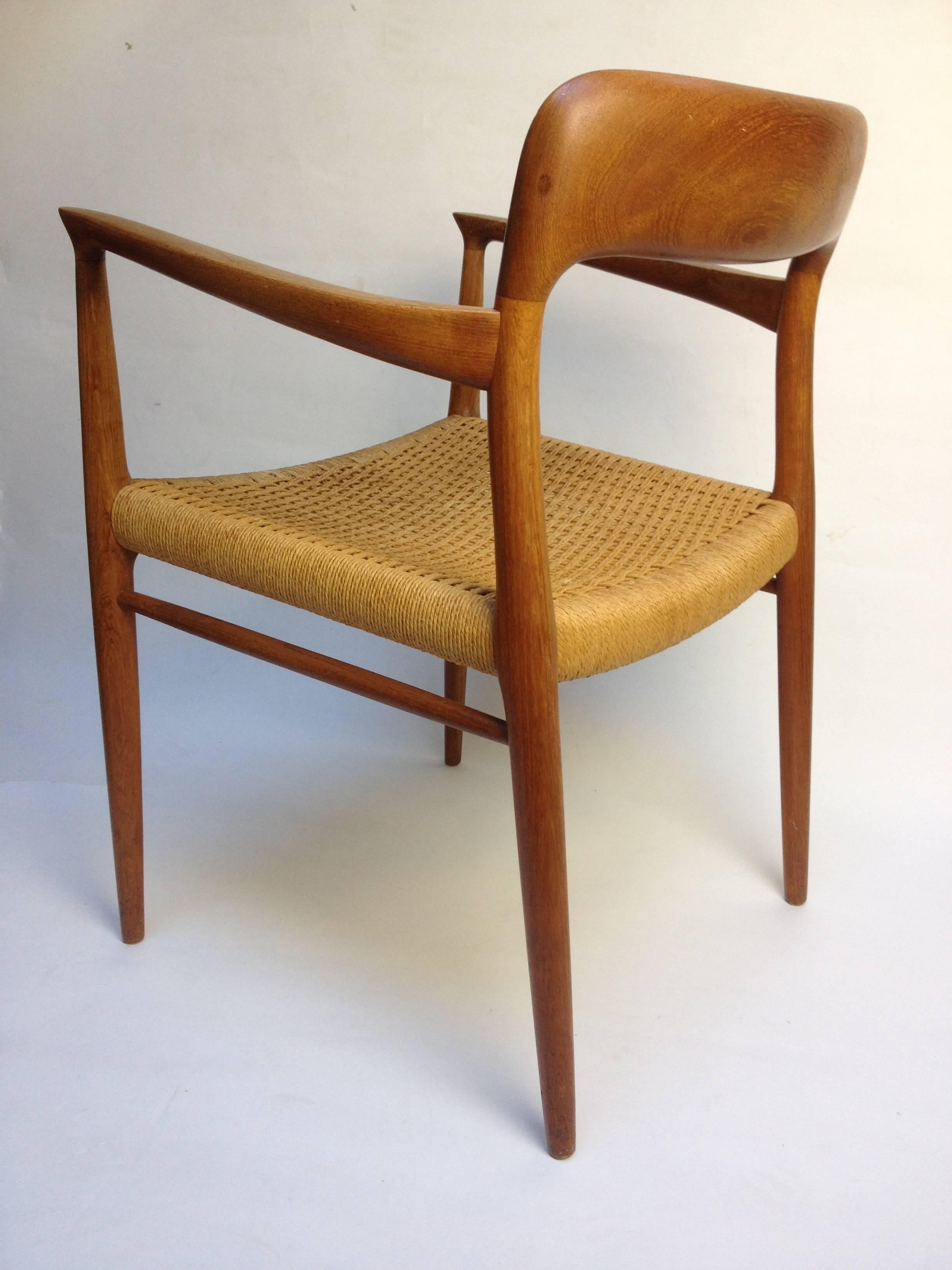 Incredible Mid-Century Modern quality teak carver (armchair) designed by Niels Moller for J.L. Moller. Made in Denmark, very good vintage condition. Perfect addition if you already have some of this model by J.L. Moller or would make a fabulous desk