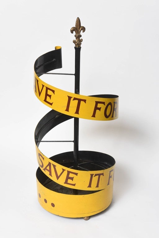 The fanciful tole umbrella stand is inscribed: 