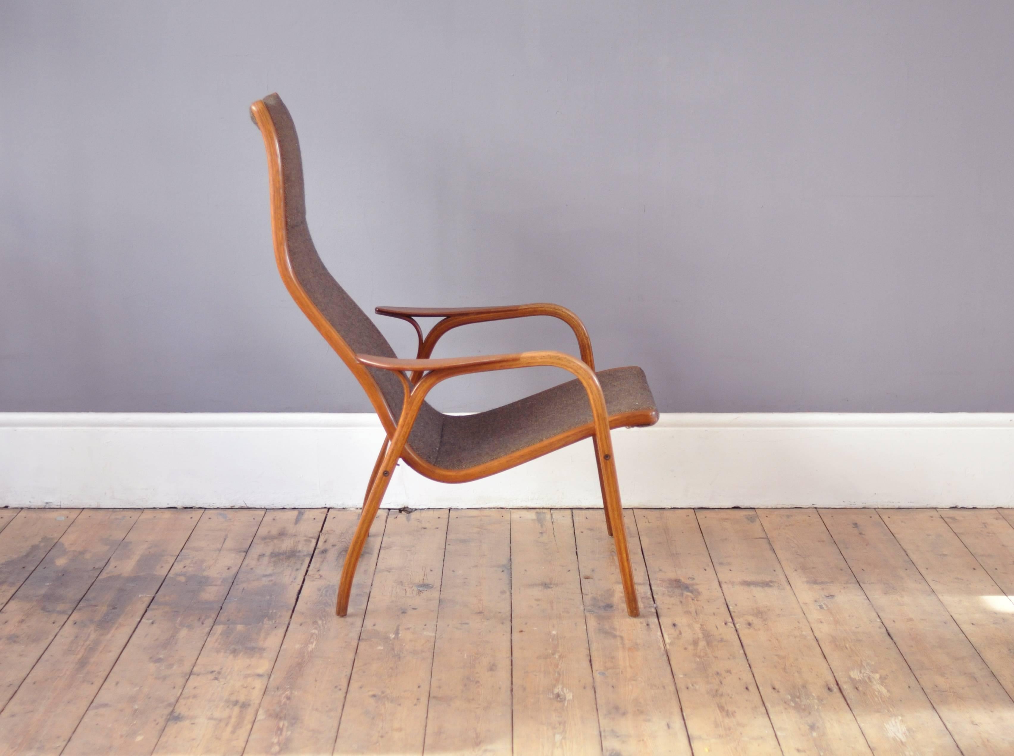 Supremely comfortable, Lamino easy chair. Iconic armchair by acclaimed Swedish designer Yngve Ekström. Sold as is.