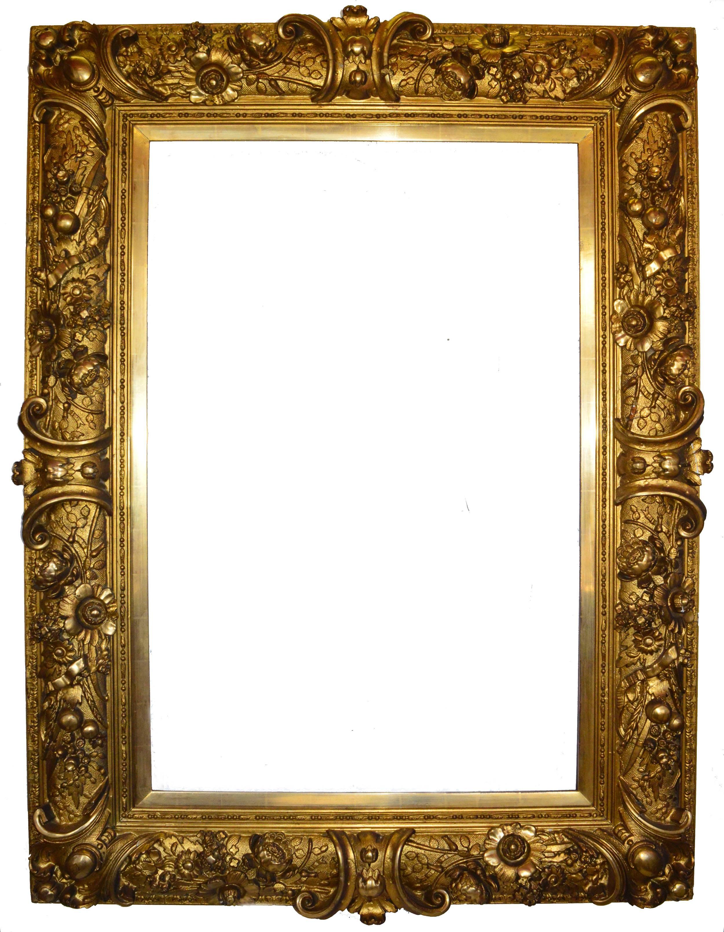 Substantial giltwood Baroque-style frame from Europe. Would be a grand finishing touch for a painting of the period or for a mirror.
Opening, 41" H x 26" W.
Frame width, 7.75".
Outside dimensions, 56.25" H x 41.5" W x