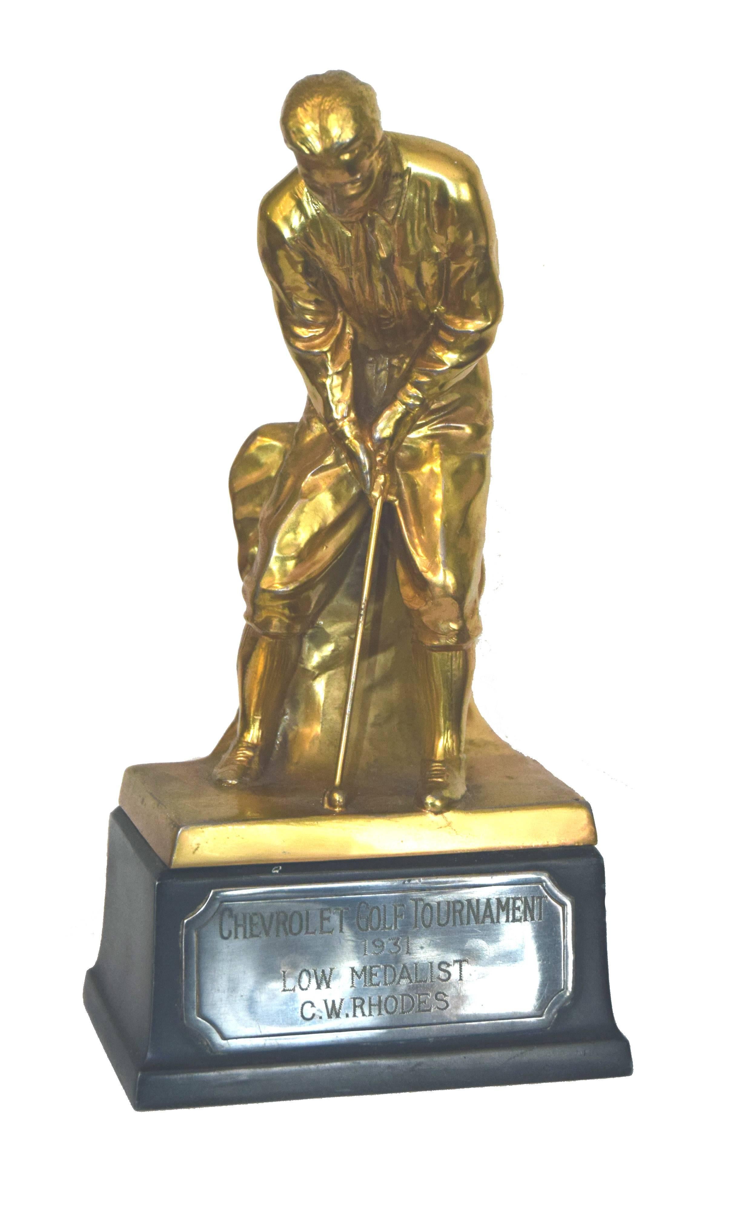 A wonderful Weidlich Brothers of New York trophy. Dedicated to the Low Score Medalist in an Amateur Golf Event presented by Chevrolet car Company to C.W. Rhodes (G.W. Rhodes) an amateur golfer who was a leader in the Automobile Gas Age in