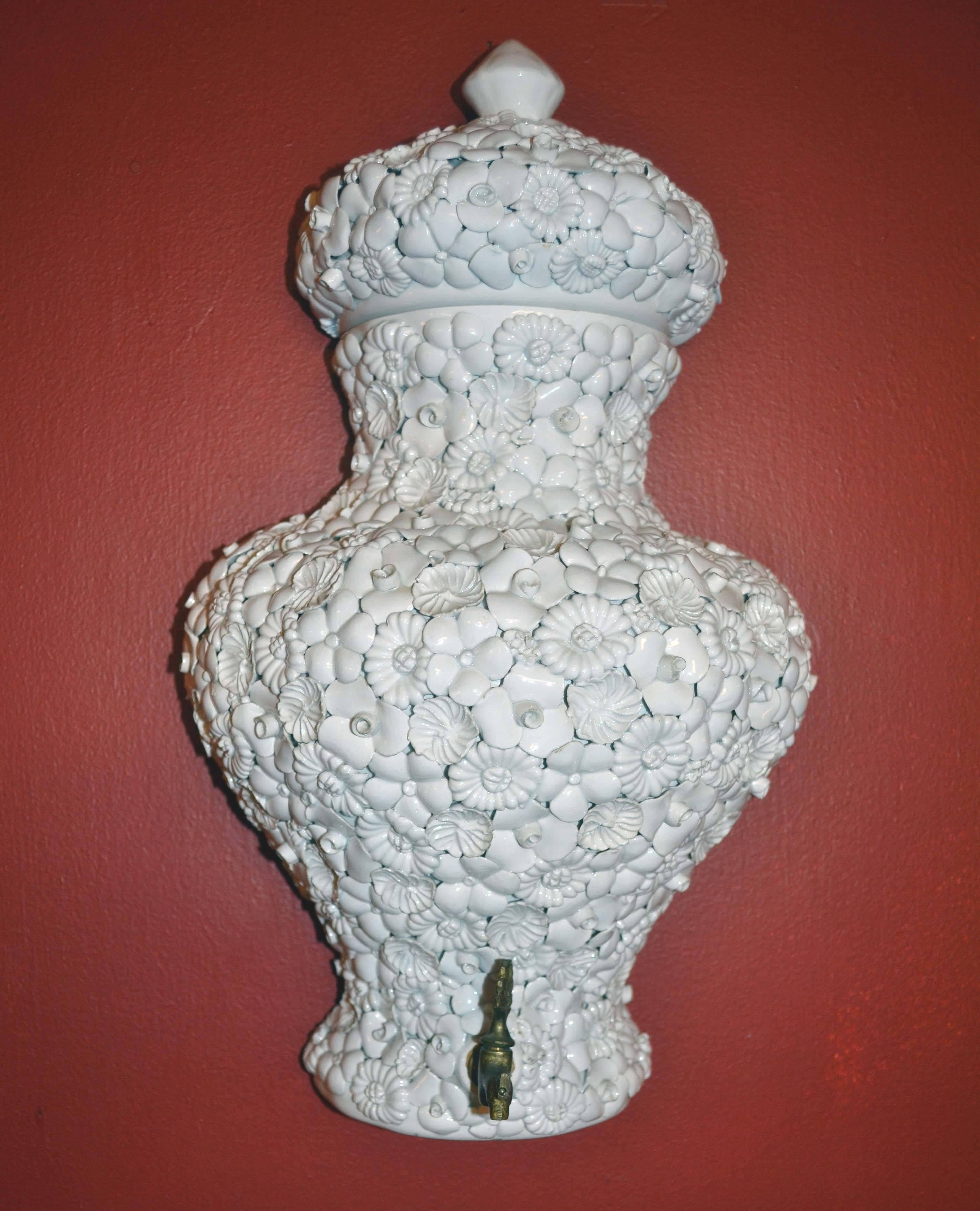 Rare and exquisite, this Italian Fiori Blanco porcelain lavabo wall fountain, circa 1950s. Comprised of three pieces, the mark on verso reads ARDALT Fiori Blanco #819, Italy. The water reservoir/urn with lid measures 16