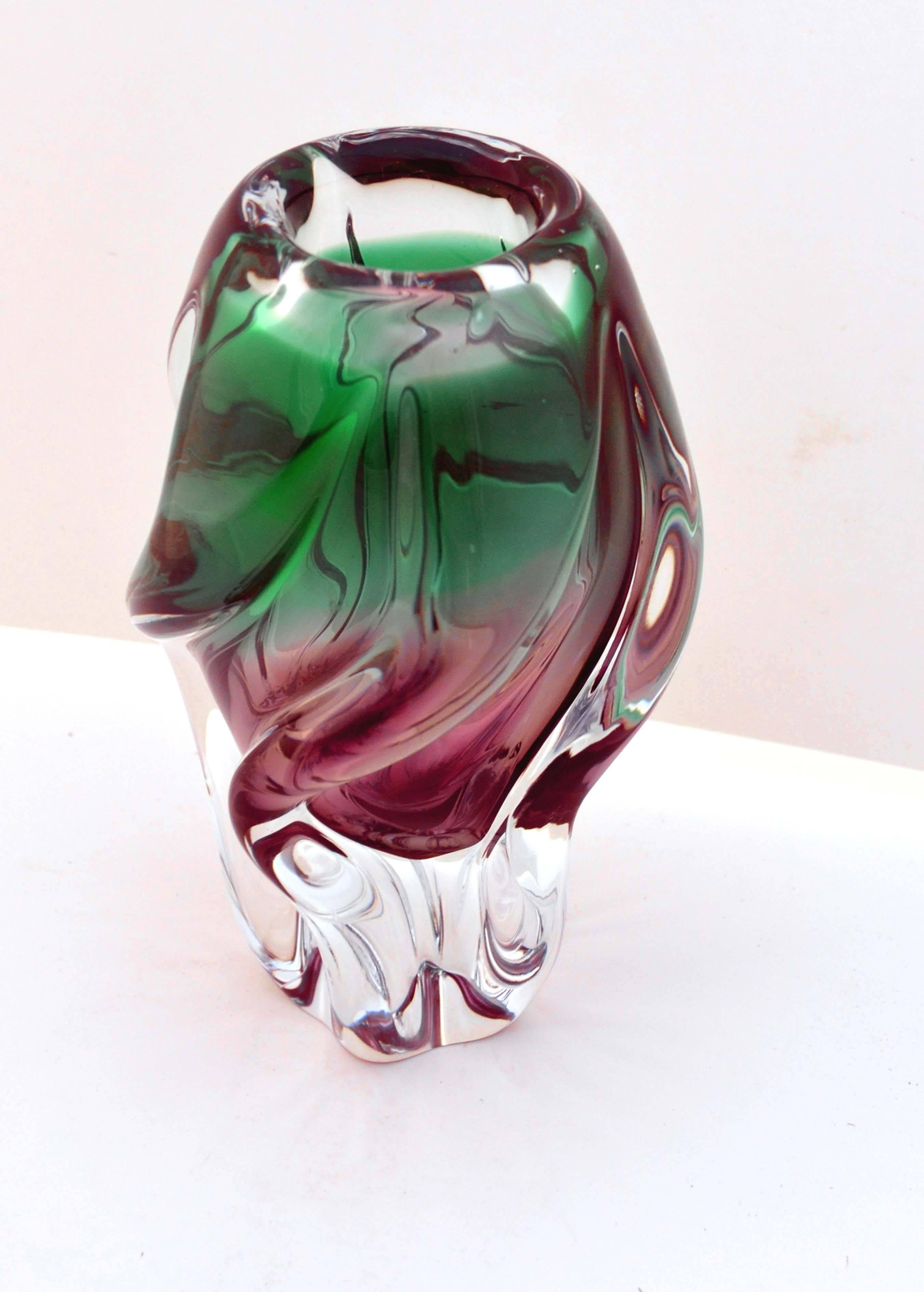 Beautiful heavy swirl green and amethyst vase in clear and green/grape color by Josef Hospodka (Czechoslavkian, 1923-1989) of SKLO Union Chribska Glassworks, circa 1970. Measures: 7