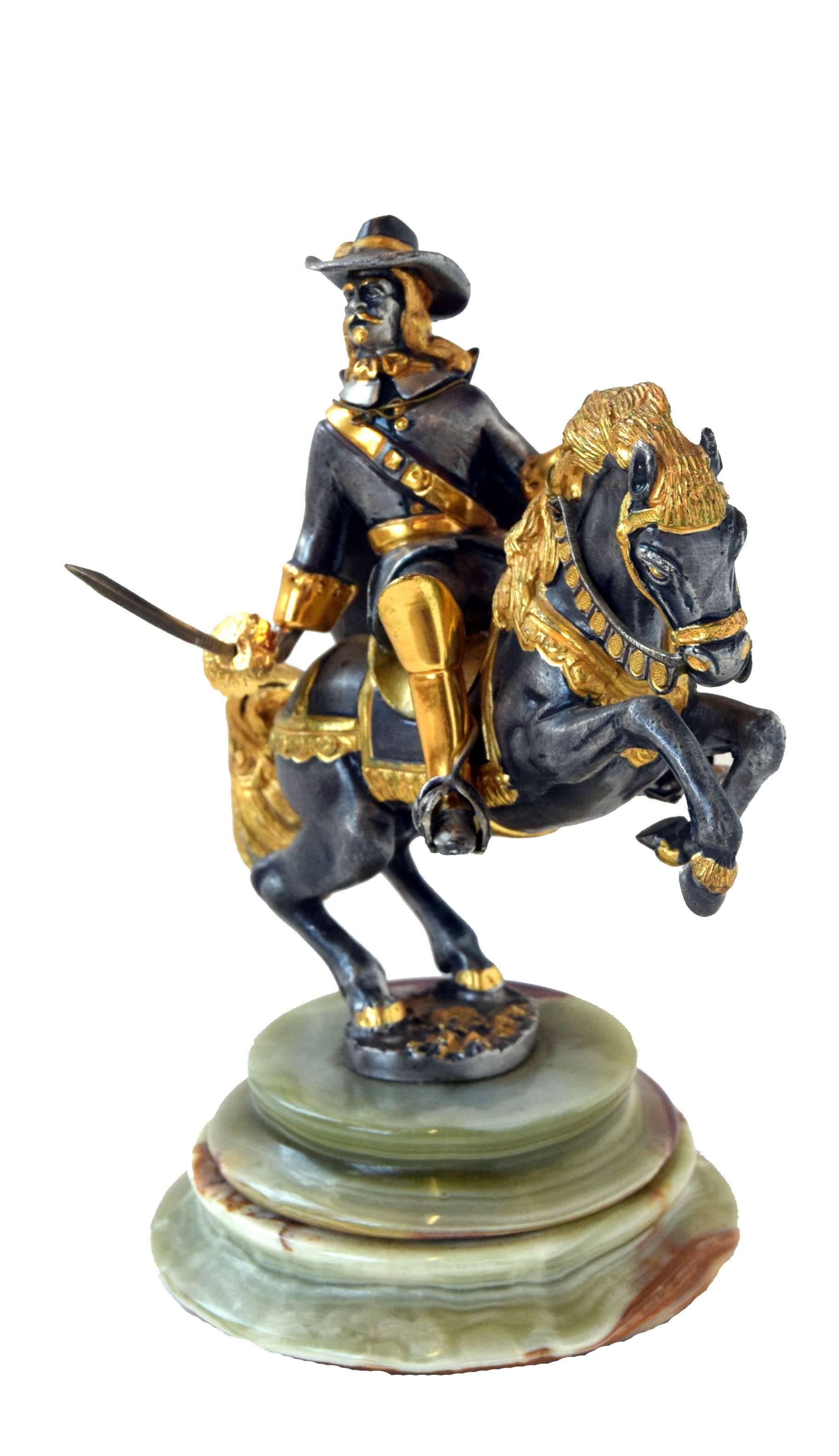 Giuseppe Vasari Hero series horseback Cavalier for Gorham Silver Company - .800 silver over bronze and 22-karat gold gilded figurine - 192/250. Size: 5 inches (12.7 cm). The statue is 8.5
