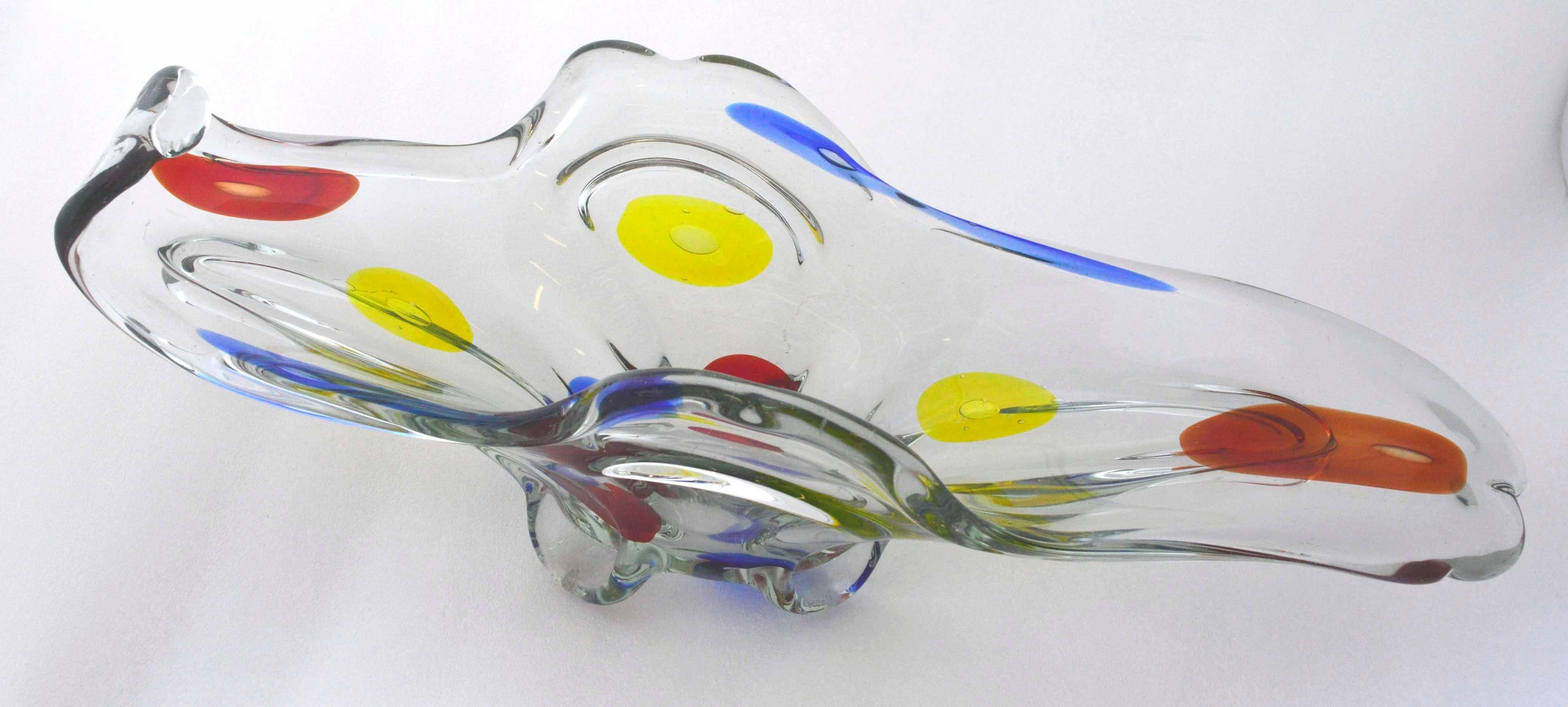 Stunning Mid-Century clear and large spots horizontal centerpiece. Asymmetrical with red, yellow and blue stretched dots with bubbles within adds fun and depth. A Pentoni design attributed to Fratelli Toso Company Condition: repaired mar on one