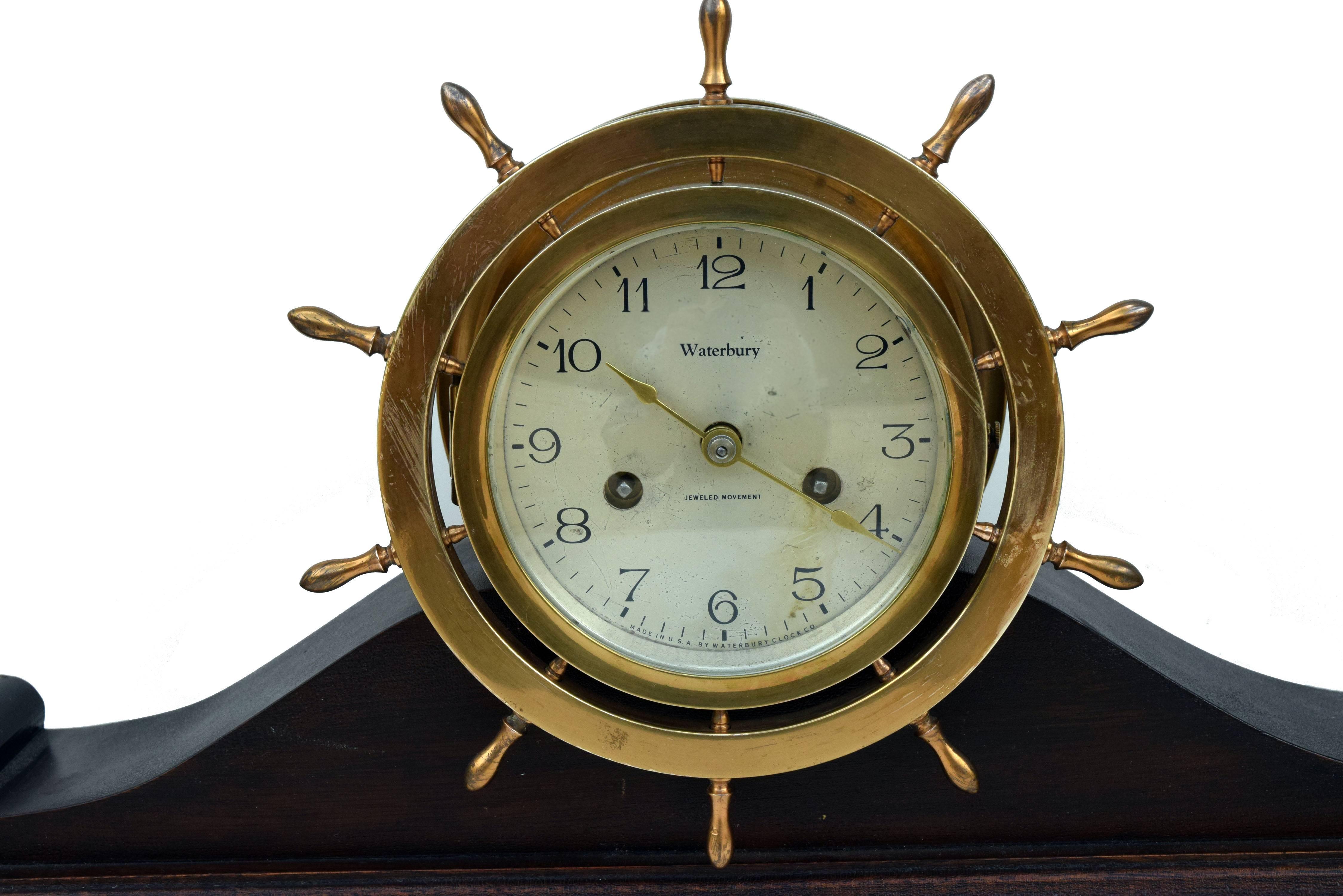 Waterbury Clock Company ships bell, no. 11 clock, circa 1915, on a mahogany base. We have completely overhauled and adjusted the movement and bells for accurate time keeping and reliability. Ships bell time, chimes on the Hour and half hour, circa