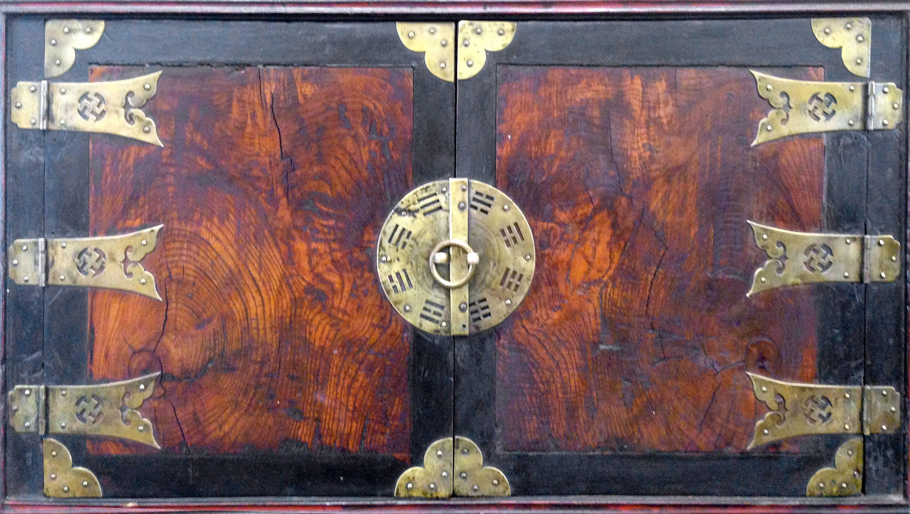 A 19th century Korean Elmwood cabinet. Writing on inside paper reads in Chinese characters 