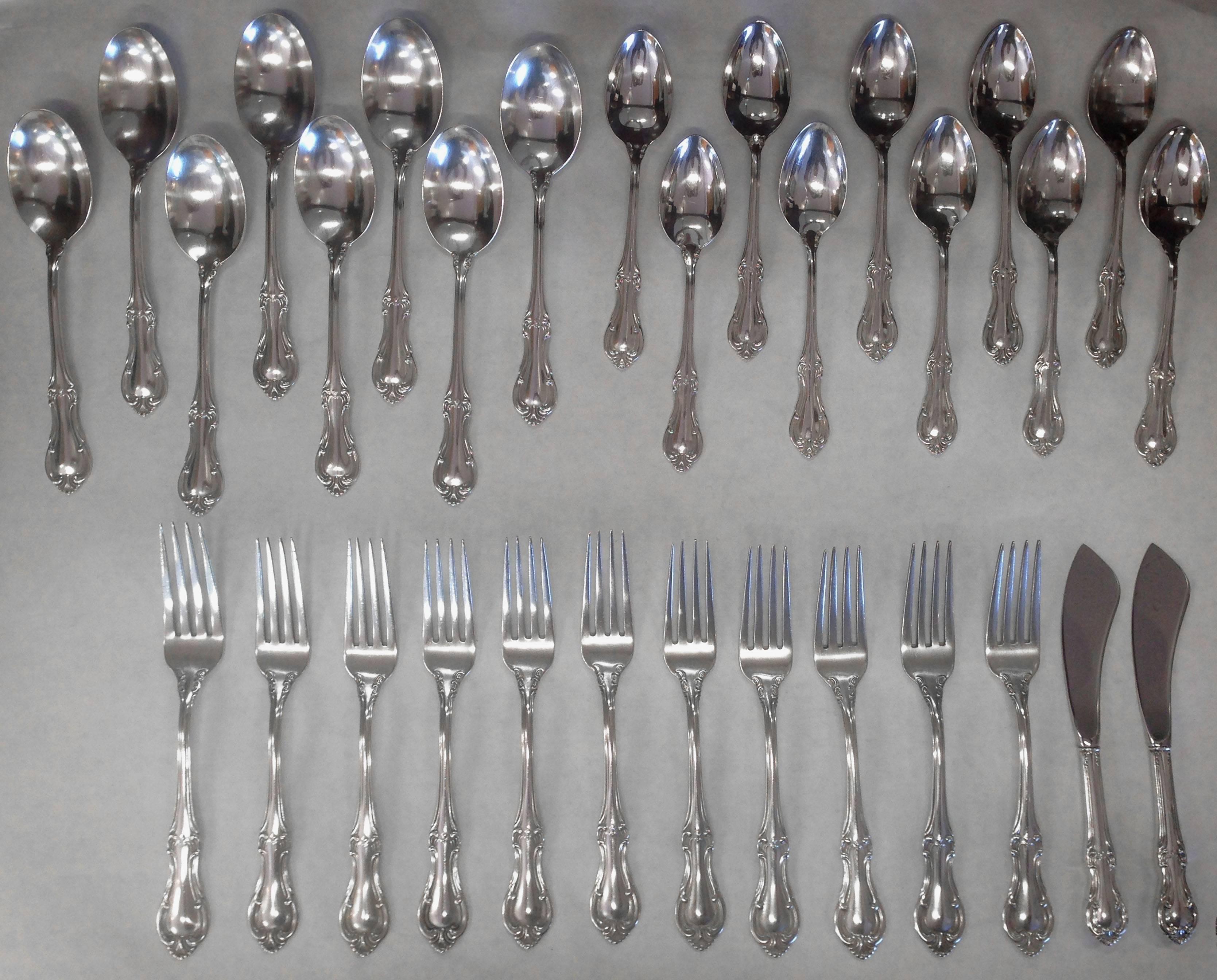 International silver company Joan of Arc pattern of 1940. Nice clean service. A large almost complete service for twelve, many pieces were new in package and the rest had little or no use. Most used were Dinner forks, knives and soup spoons.