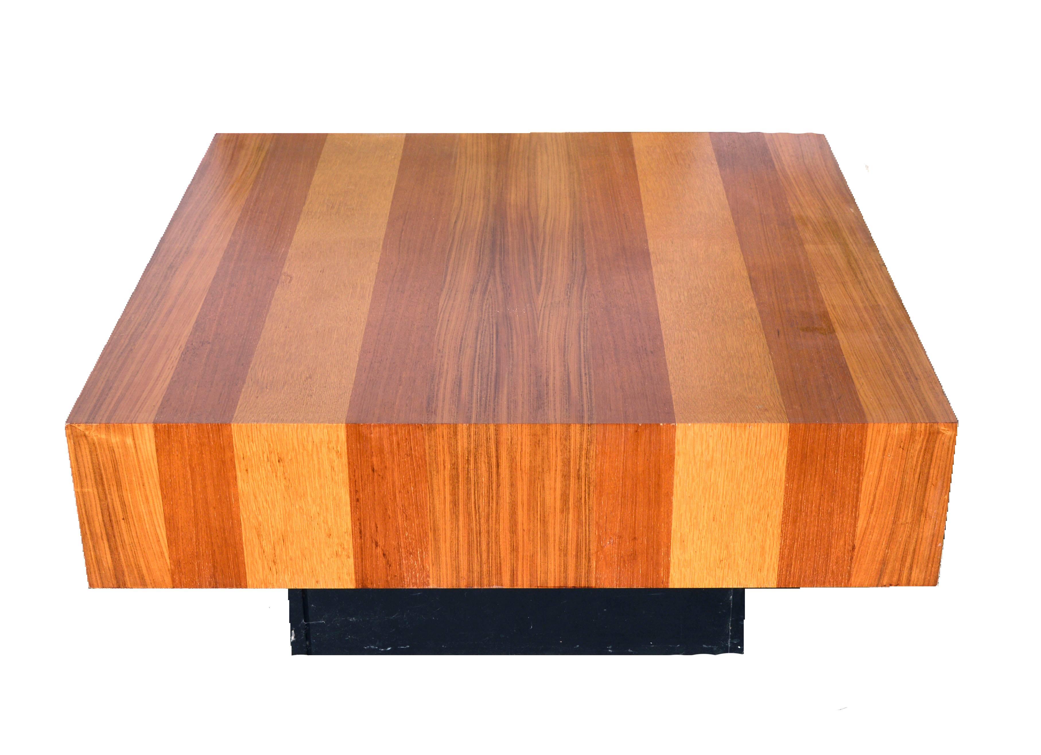 Drylund of Denmark parquetry wood coffee table. Exotic wood veneers in teak and curly maple over composition wood on a black lacquered wood base. Founded in 1960, Dyrlund has been manufacturing high quality furniture for many years. Standard parcel