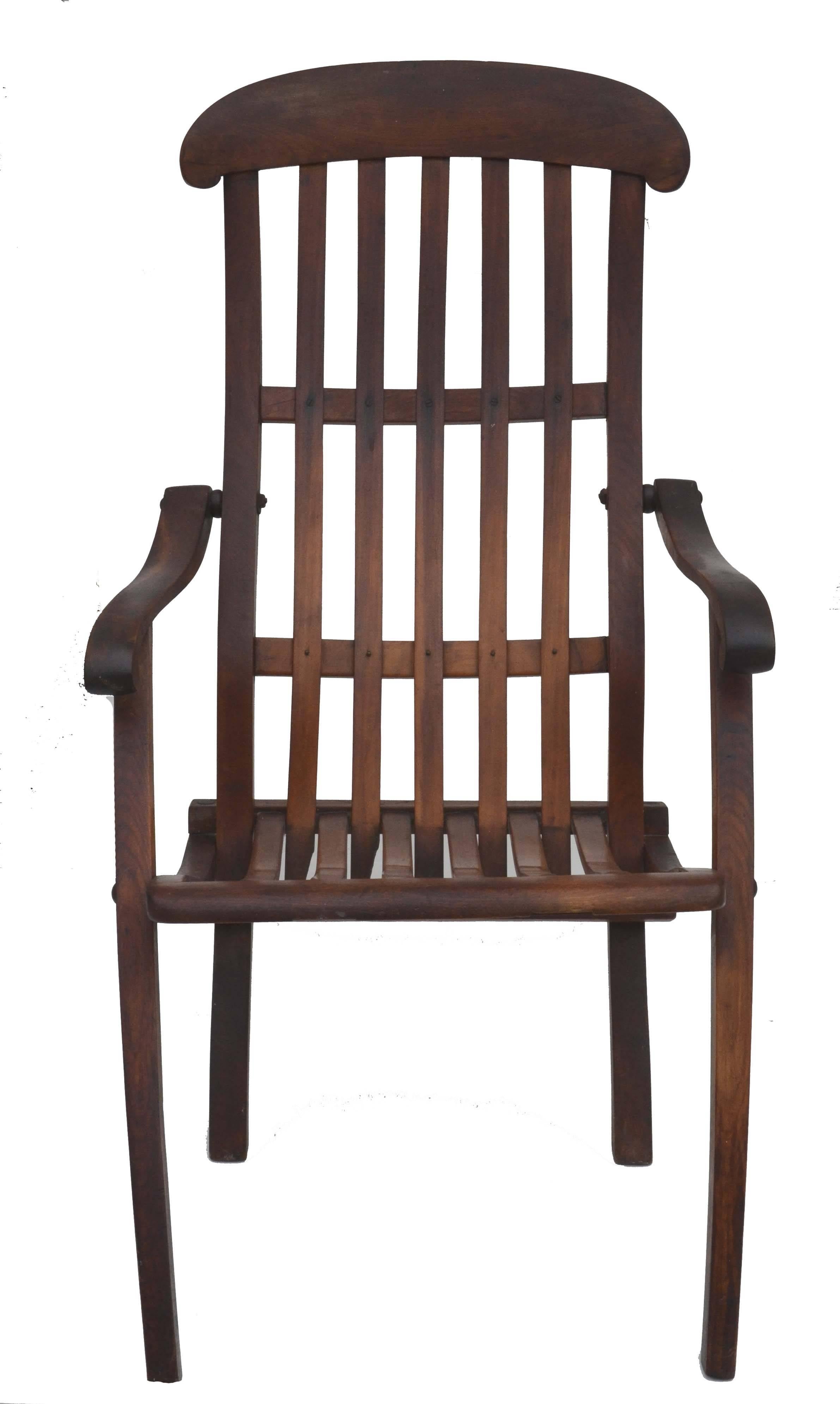 Wonderful dark teak antique folding deck lounge chair. Original hardware and finish. Very comfortable and cushion not necessary. circa 1900. Condition and wear consistent with age. folds for storage and convenience. Size 38" H x 38" W.